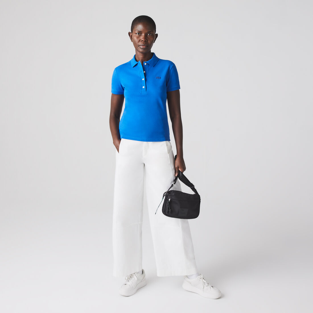 تيشيرت بولو L.12.D بقصة ضيقة من قماش بيتي بيكيه المطاطي Women's Lacoste Slim fit Stretch Cotton Pique Polo Shirt - PF5462-00-K1Q