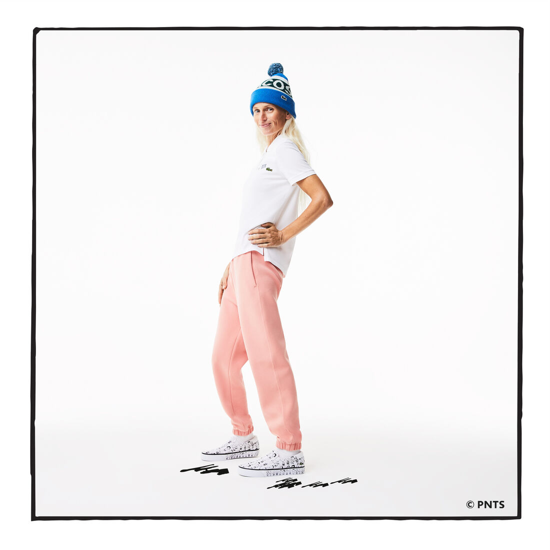 قميص بولو نسائي من القطن العضوي ذو قصة عادية من Lacoste x Peanuts قميص بولو نسائي من القطن العضوي ذو قصة عادية من Lacoste x Peanuts