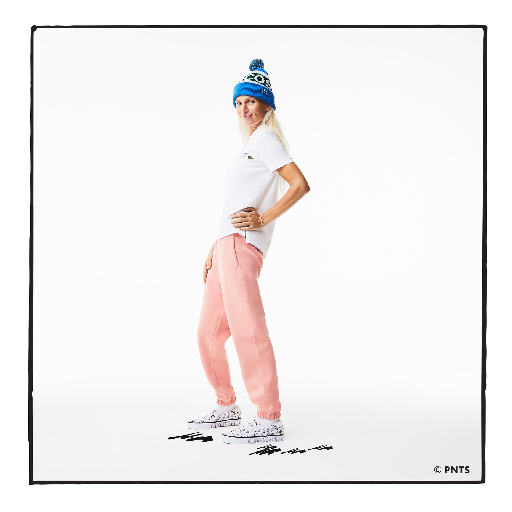 قميص بولو نسائي من القطن العضوي ذو قصة عادية من Lacoste x Peanuts قميص بولو نسائي من القطن العضوي ذو قصة عادية من Lacoste x Peanuts