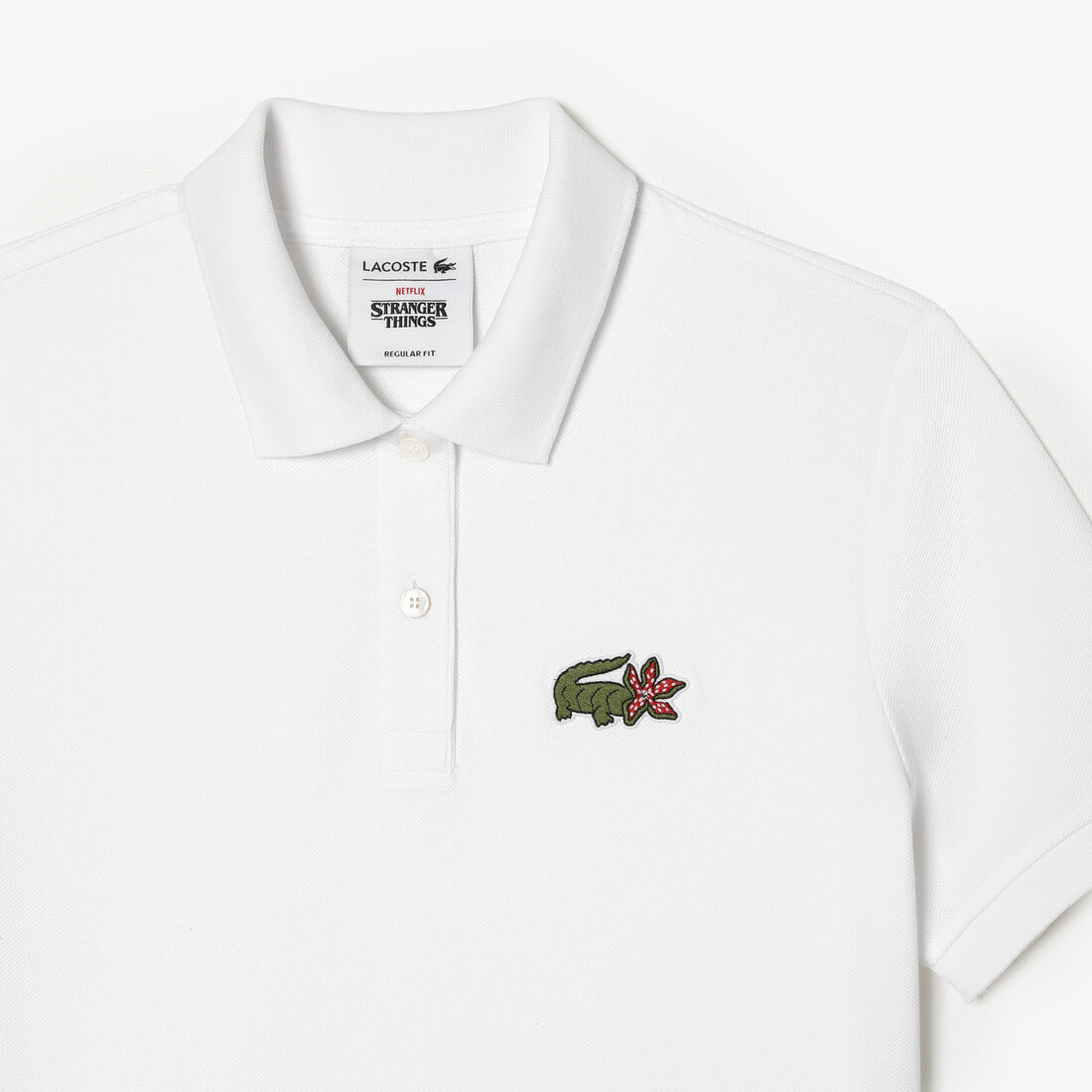 تيشيرت بولو بطبعة تمساح للنساء مجموعة Lacoste x Netflix تيشيرت بولو بطبعة تمساح للنساء مجموعة Lacoste x Netflix