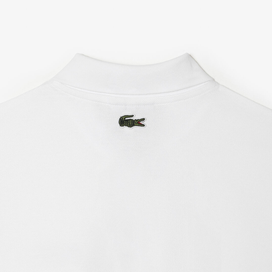 تيشيرت بولو بطبعة تمساح للنساء مجموعة Lacoste x Netflix تيشيرت بولو بطبعة تمساح للنساء مجموعة Lacoste x Netflix
