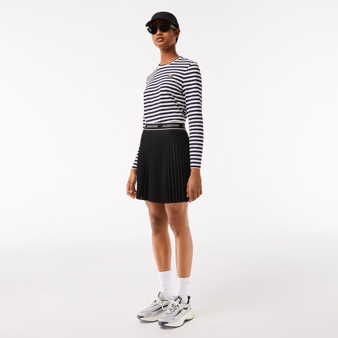 تنورة لاكوست قصيرة بطيات وخصر مطاطي للنساء تنورة لاكوست قصيرة بطيات وخصر مطاطي للنساء