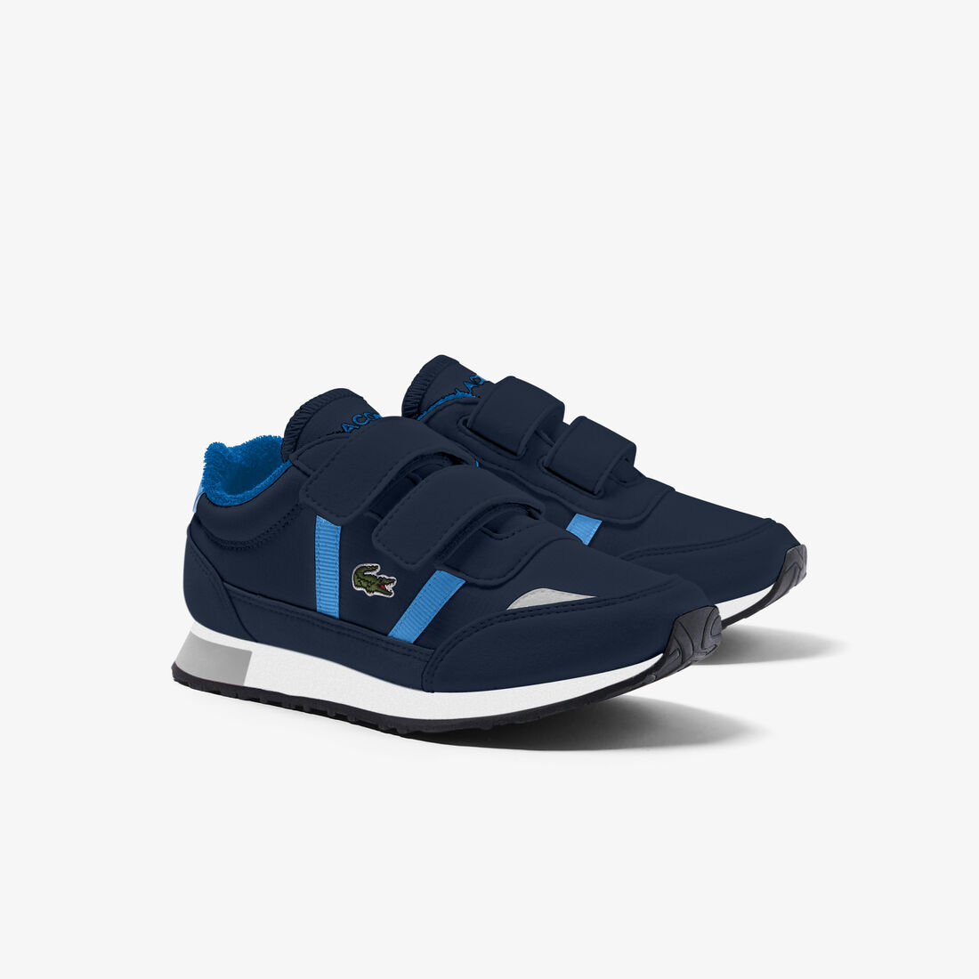 سنيكرز لاكوست بارتنر من خامات صناعية بتفاصيل ملونة للرضع سنيكرز لاكوست بارتنر من خامات صناعية بتفاصيل ملونة للرضع