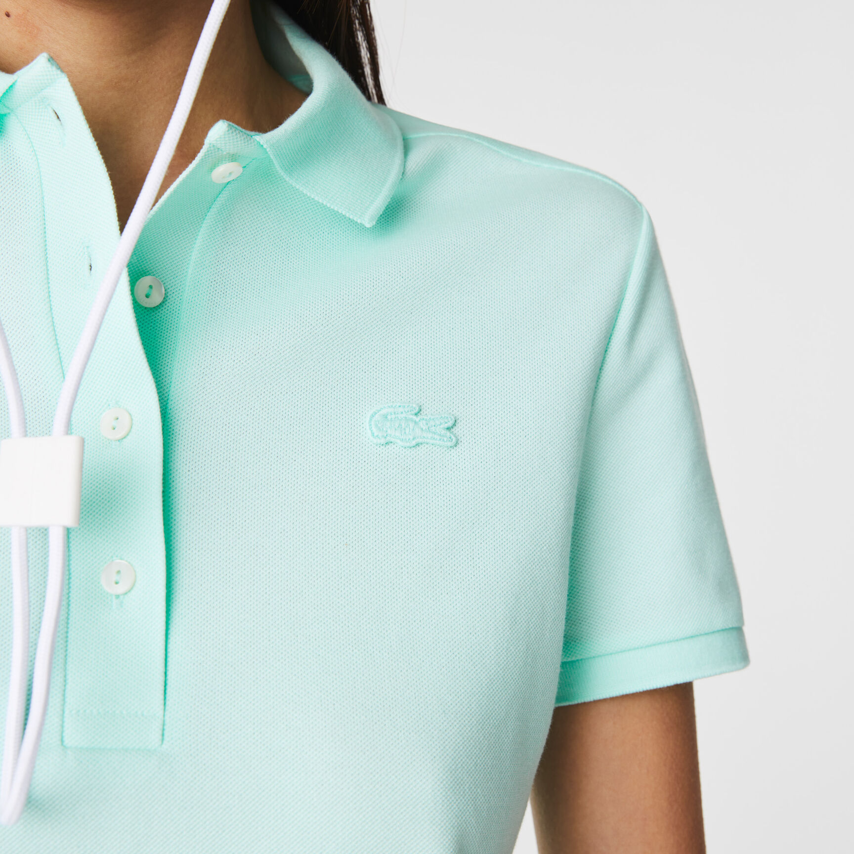 تيشيرت بولو L.12.D بقصة ضيقة من قماش بيتي بيكيه المطاطي تيشيرت بولو L.12.D بقصة ضيقة من قماش بيتي بيكيه المطاطي