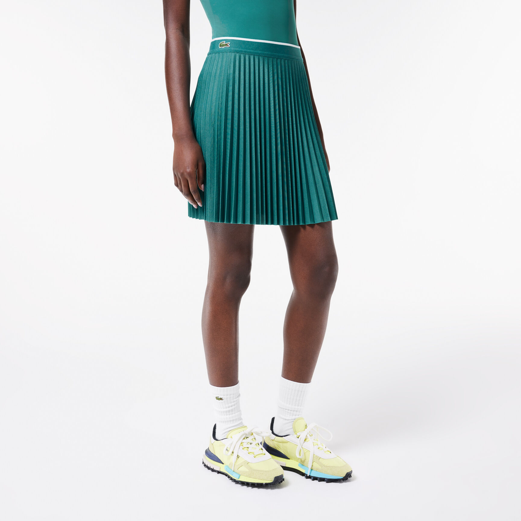 سترة بياقة بولو وألوان مغايرة صُنعت في فرنسا Short Pleated Elastic Waist Skirt - JF2701-00-SI0