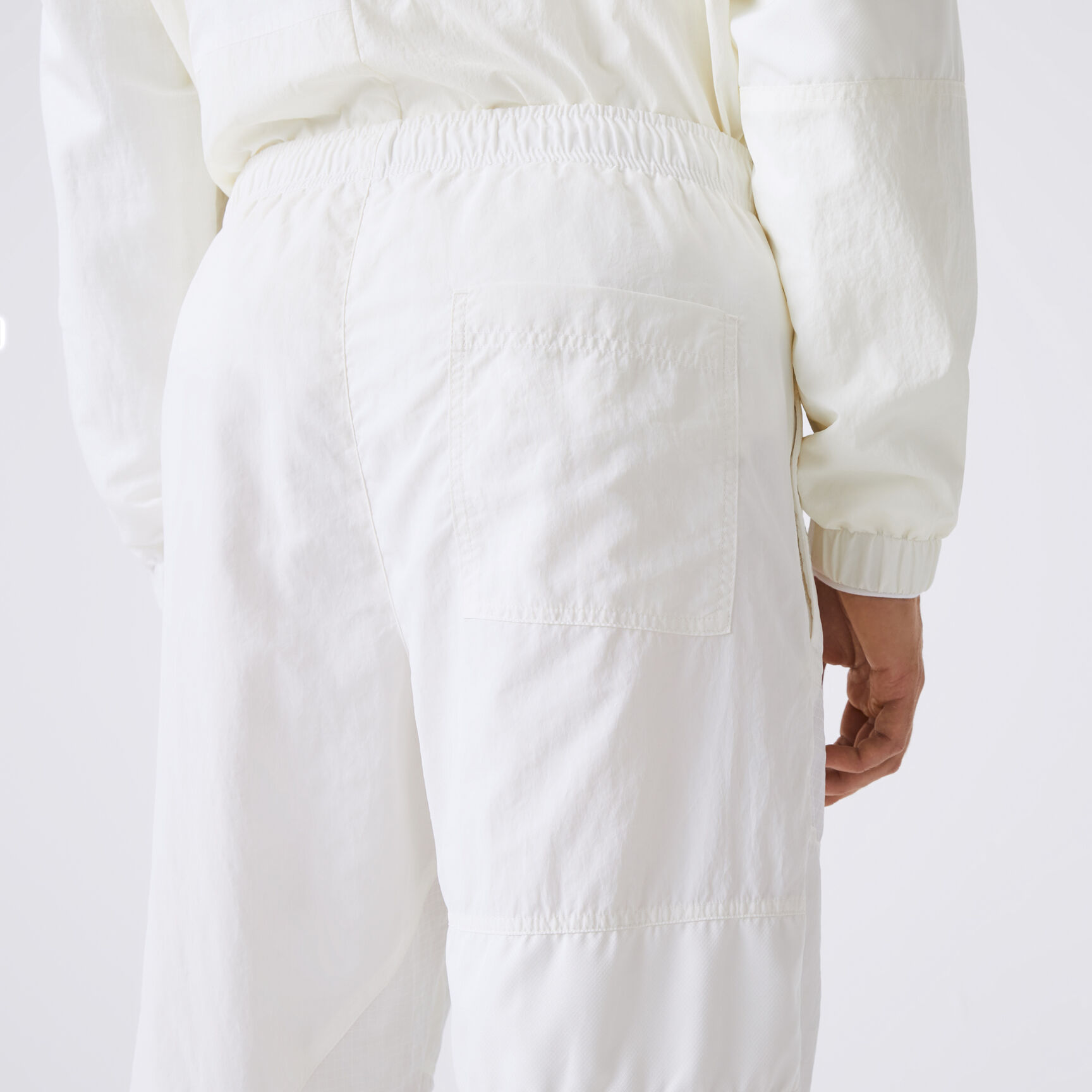 بنطال رياضي لاكوست مقسم لأجزاء ومقاوم للماء للرجال بنطال رياضي لاكوست مقسم لأجزاء ومقاوم للماء للرجال