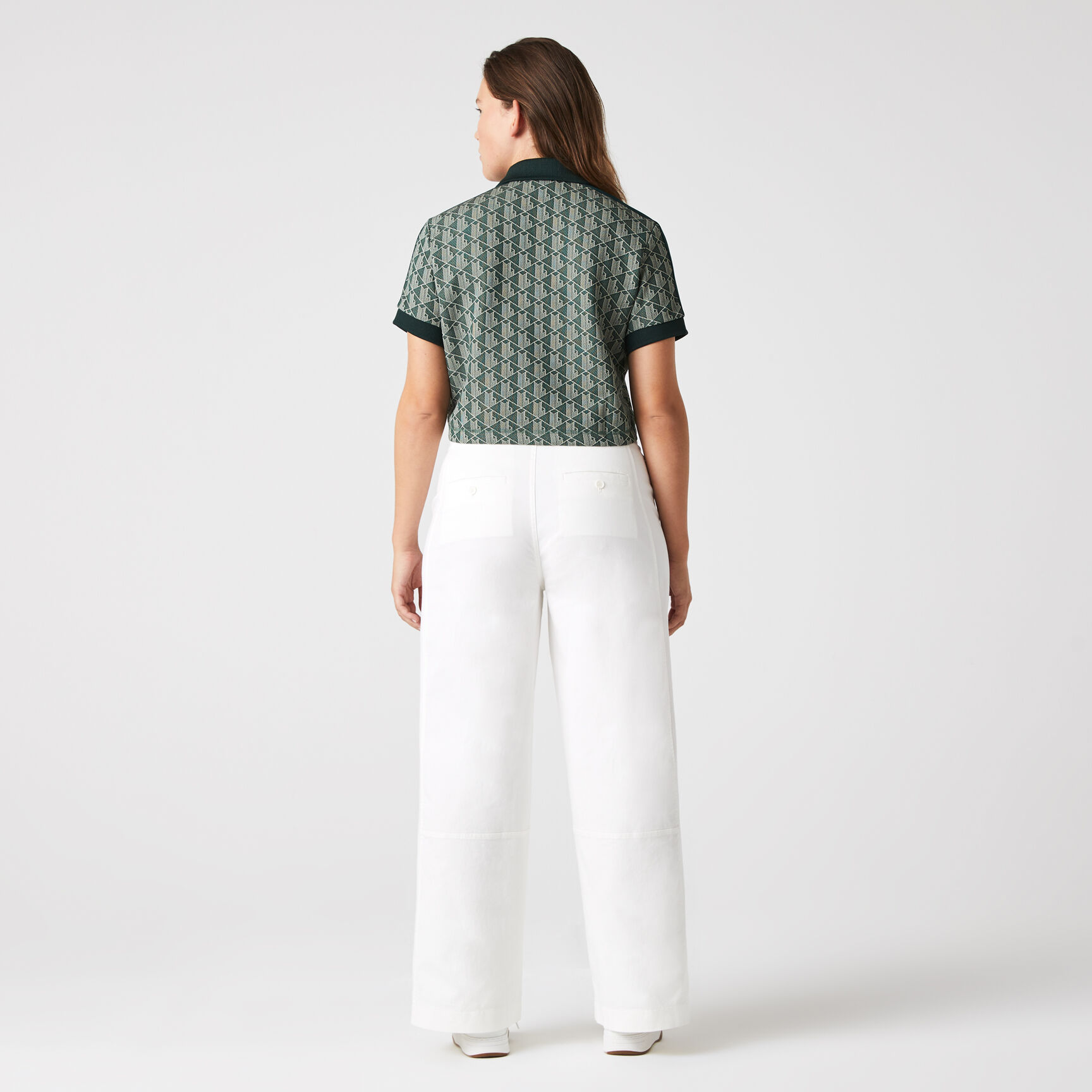 تيشيرت بولو بقصة عادية وياقة بلون مغاير ونقشة شعار الماركة للنساء تيشيرت بولو بقصة عادية وياقة بلون مغاير ونقشة شعار الماركة للنساء