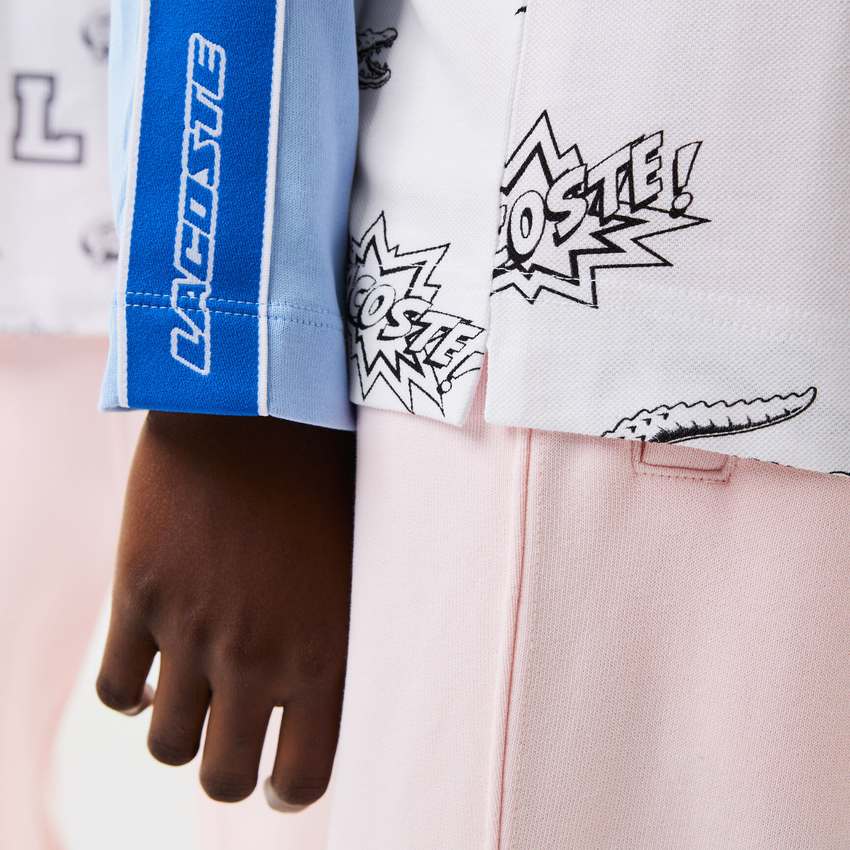 تيشيرت بولو لاكوست بطبعة قابلة للتعديل الشخصي من تشكيلة موسم الأعياد للجنسين تيشيرت بولو لاكوست بطبعة قابلة للتعديل الشخصي من تشكيلة موسم الأعياد للجنسين