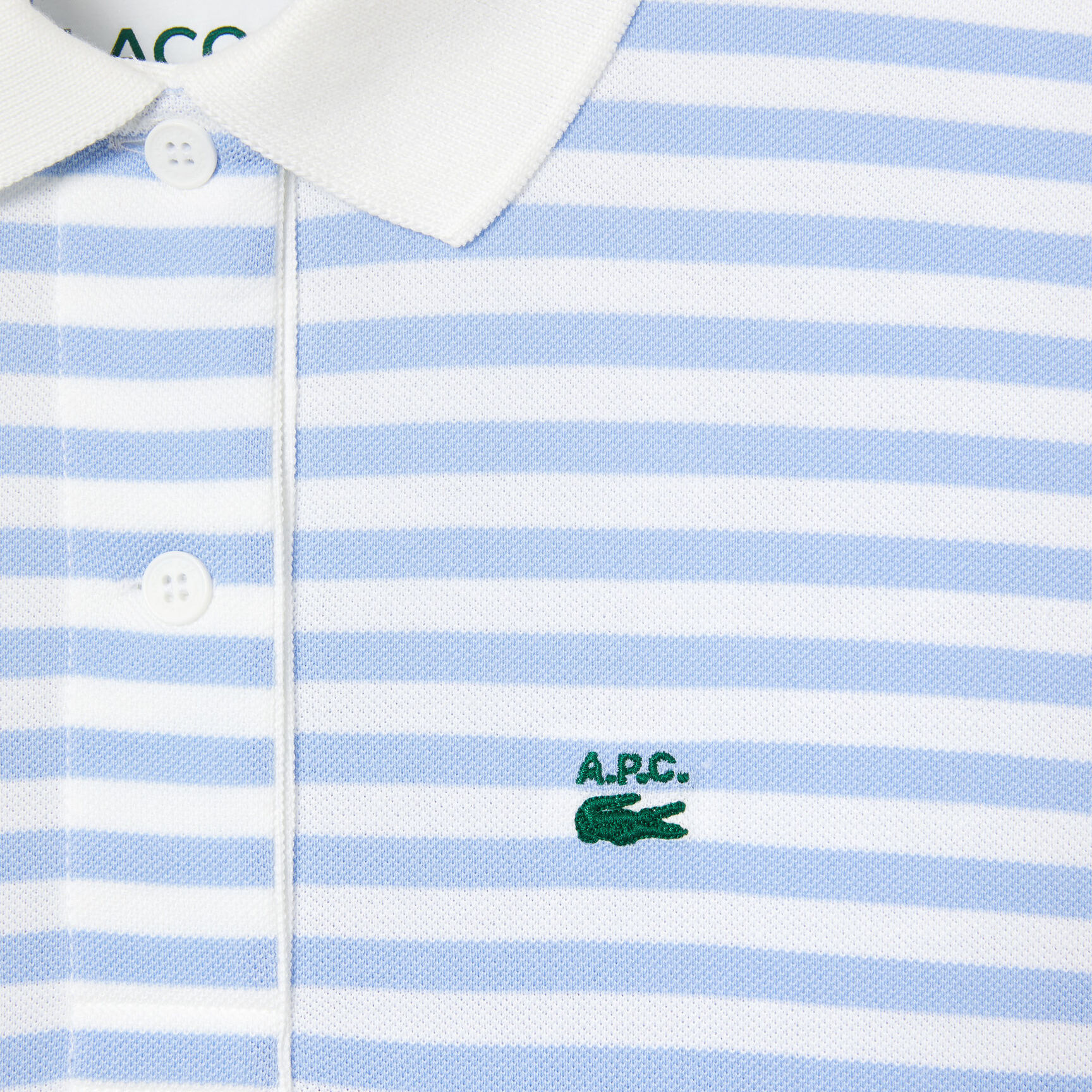 تيشيرت بولو مخطط بقصة فضفاضة للنساء مجموعة Lacoste x A.P.C. تيشيرت بولو مخطط بقصة فضفاضة للنساء مجموعة Lacoste x A.P.C.