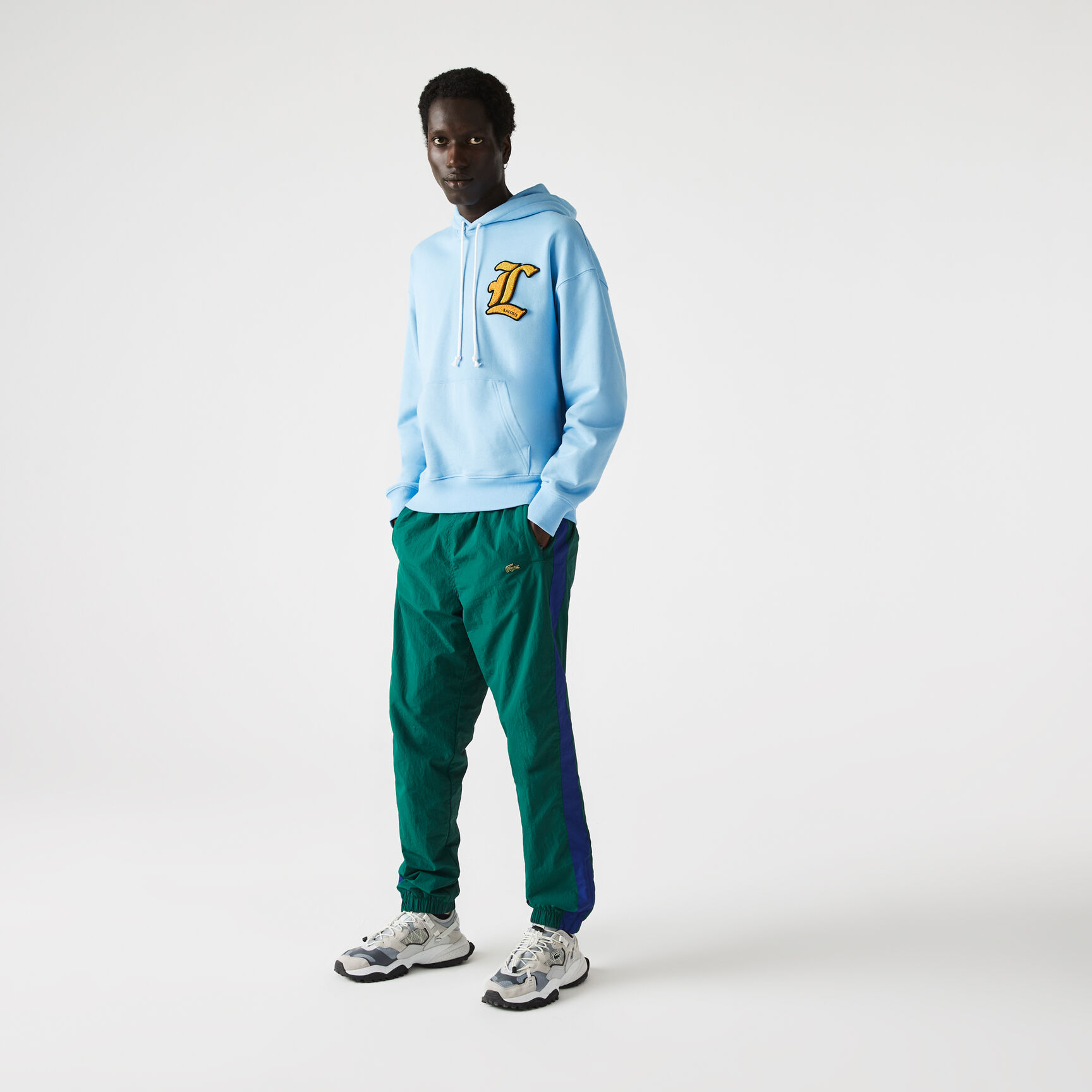 كنزة فضفاضة بغطاء للرأس للجنسين من مجموعة Lacoste L!VE كنزة فضفاضة بغطاء للرأس للجنسين من مجموعة Lacoste L!VE