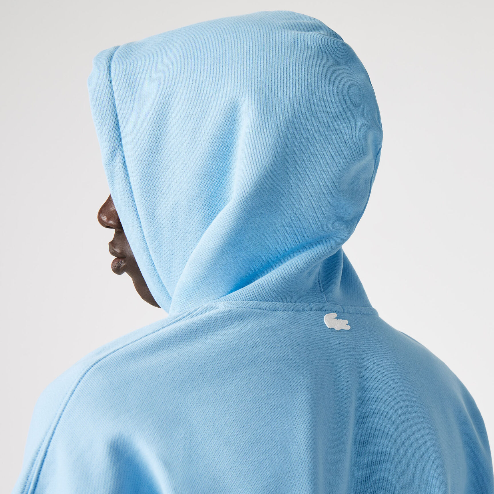 كنزة فضفاضة بغطاء للرأس للجنسين من مجموعة Lacoste L!VE كنزة فضفاضة بغطاء للرأس للجنسين من مجموعة Lacoste L!VE