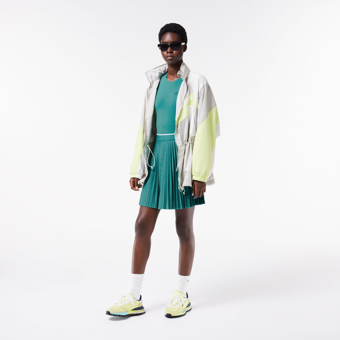 سترة بياقة بولو وألوان مغايرة صُنعت في فرنسا Short Pleated Elastic Waist Skirt - JF2701-00-SI0