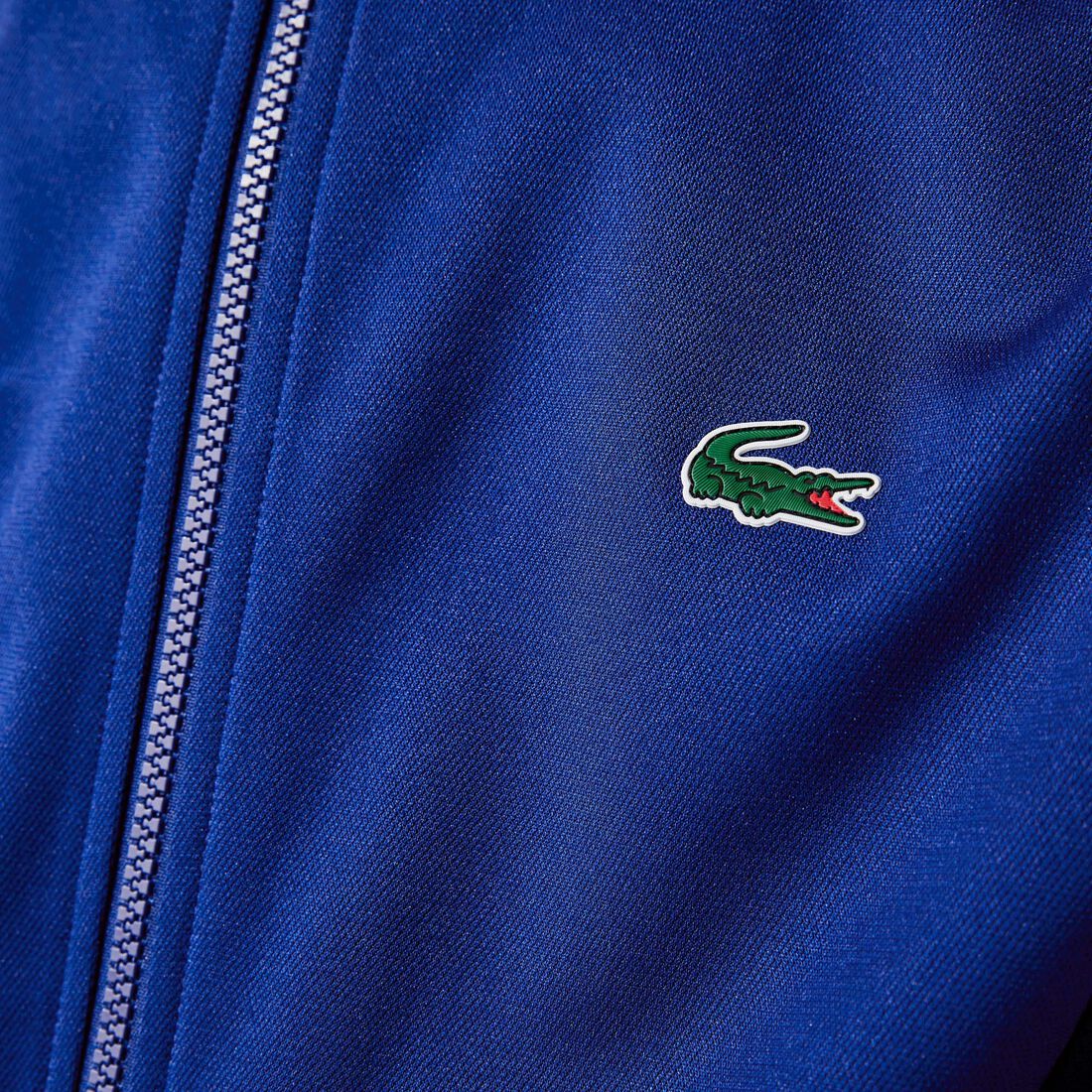 كنزة من مجموعة Lacoste SPORT ثنائية اللون مقاومة من بيكيه للرجال كنزة من مجموعة Lacoste SPORT ثنائية اللون مقاومة من بيكيه للرجال