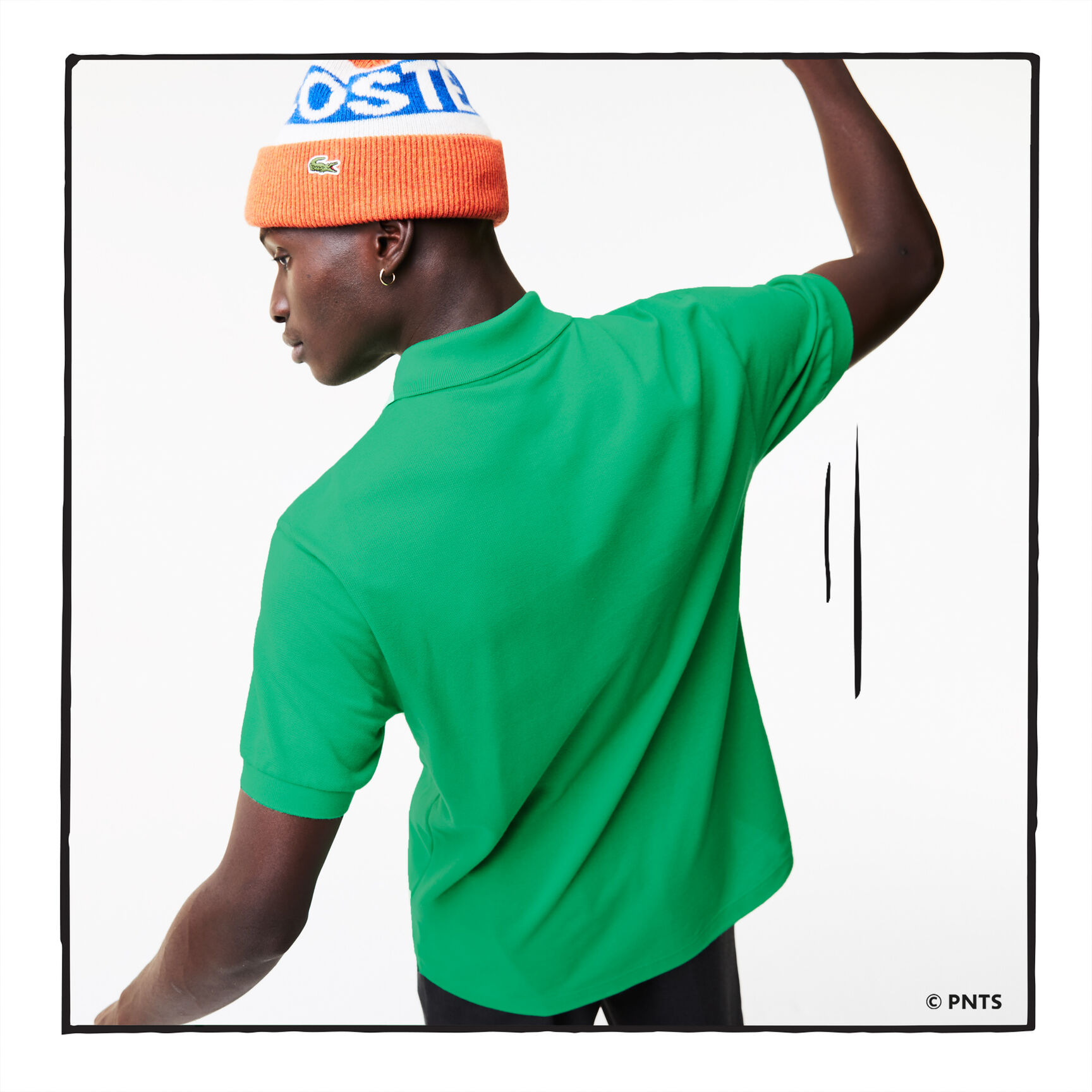 قميص بولو من القطن العضوي الرجالي من مجموعة Lacoste x Peanuts قميص بولو من القطن العضوي الرجالي من مجموعة Lacoste x Peanuts