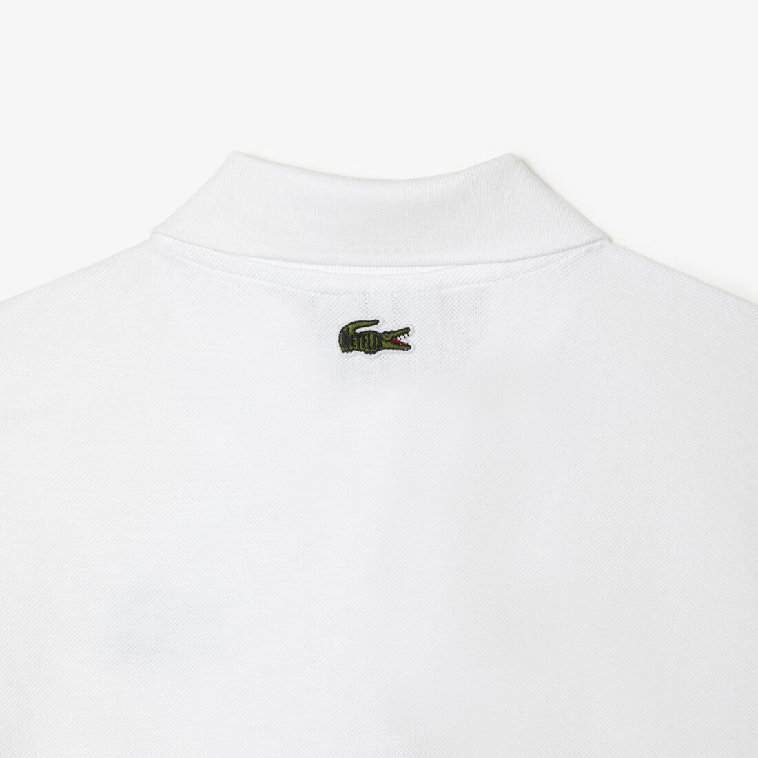تيشيرت بولو بطبعة تمساح للنساء مجموعة Lacoste x Netflix تيشيرت بولو بطبعة تمساح للنساء مجموعة Lacoste x Netflix