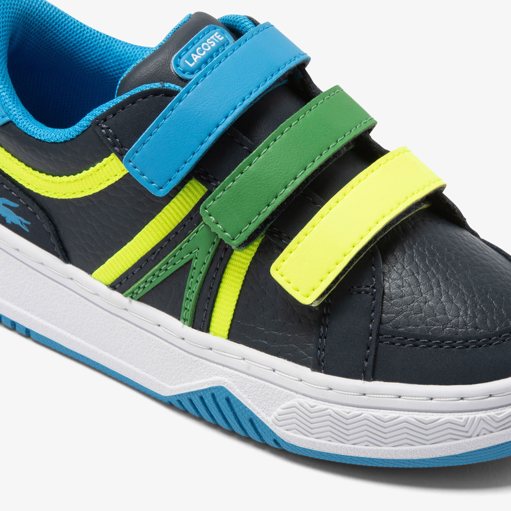 سنيكرز لاكوست L001 من خامات صناعية بثلاثة ألوان للرضع