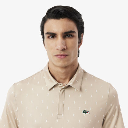 تي شيرت بولو قطن مطاطي بقصّة عادية ومزين بشريط يحمل كلمة Lacoste