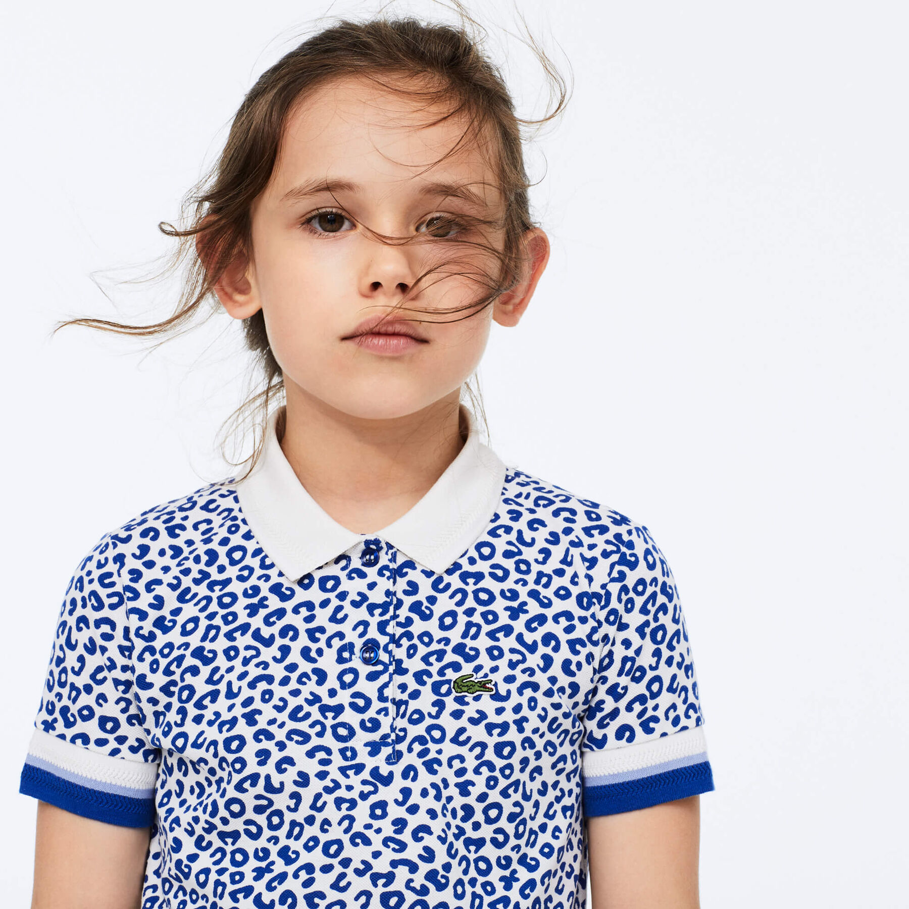 قميص بولو للبنات بطبعة الفهد من Lacoste لاكوست قميص بولو للبنات بطبعة الفهد من lacoste
