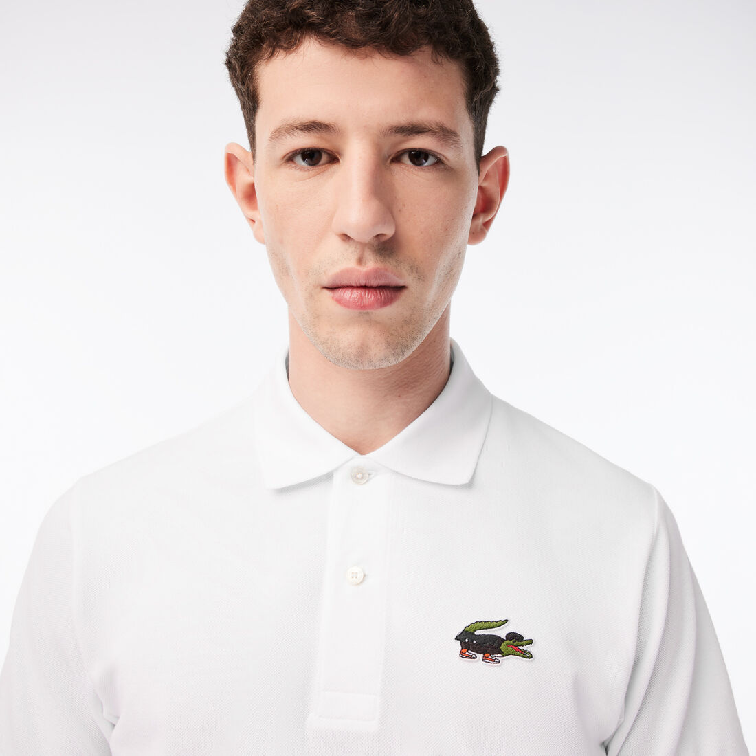تيشيرت بولو قطن عضوي للرجال مجموعة Lacoste x Netflix تيشيرت بولو قطن عضوي للرجال مجموعة Lacoste x Netflix