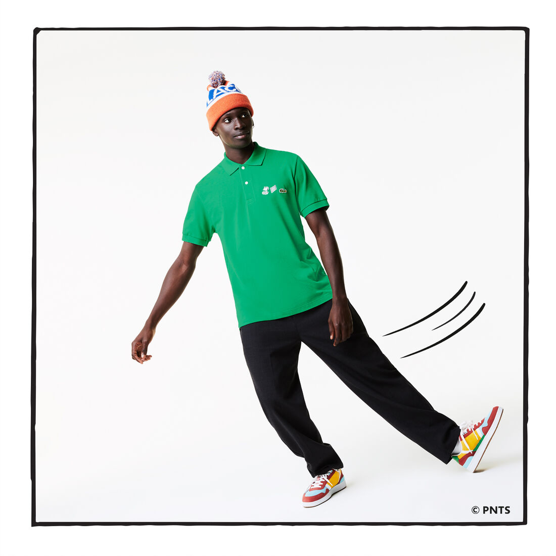 قميص بولو من القطن العضوي الرجالي من مجموعة Lacoste x Peanuts قميص بولو من القطن العضوي الرجالي من مجموعة Lacoste x Peanuts