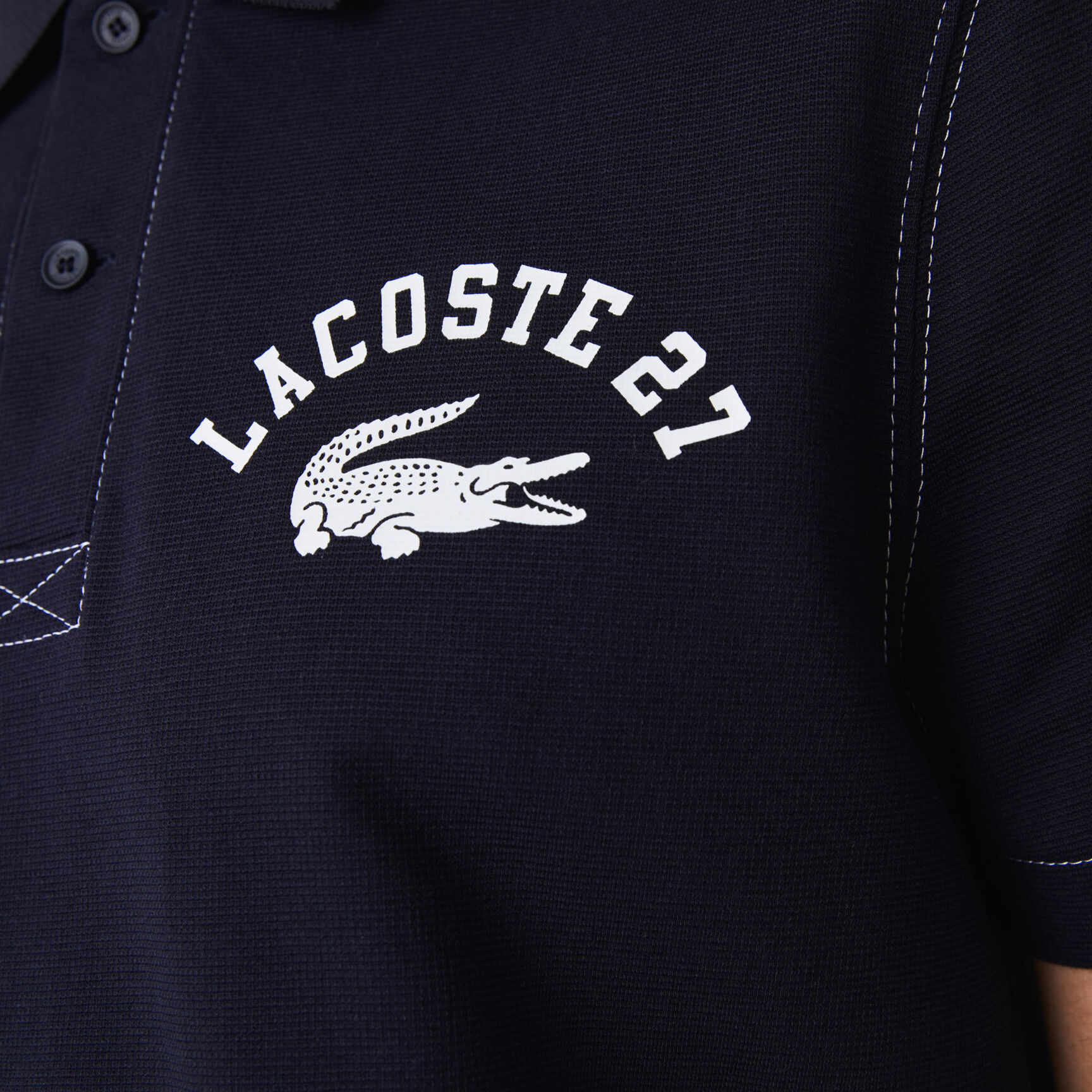 Men’s Lacoste Regular Fit Lettered Ultra-Light Knit Polo Shirt Men’s Lacoste Regular Fit Lettered Ultra-Light Knit Polo Shirt