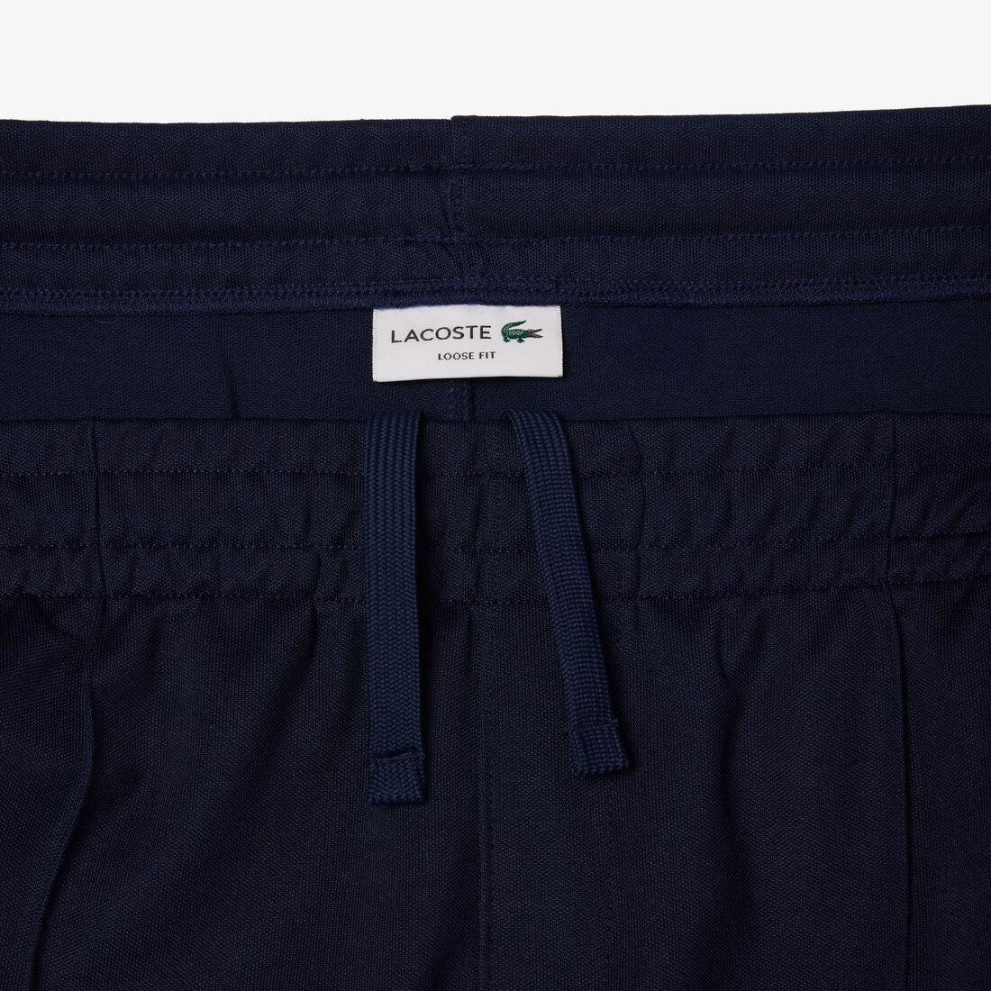 بنطال رياضي متشابك بقصّة فضفاضة Loose Fit Interlock Track Pants - XH7462-00-166