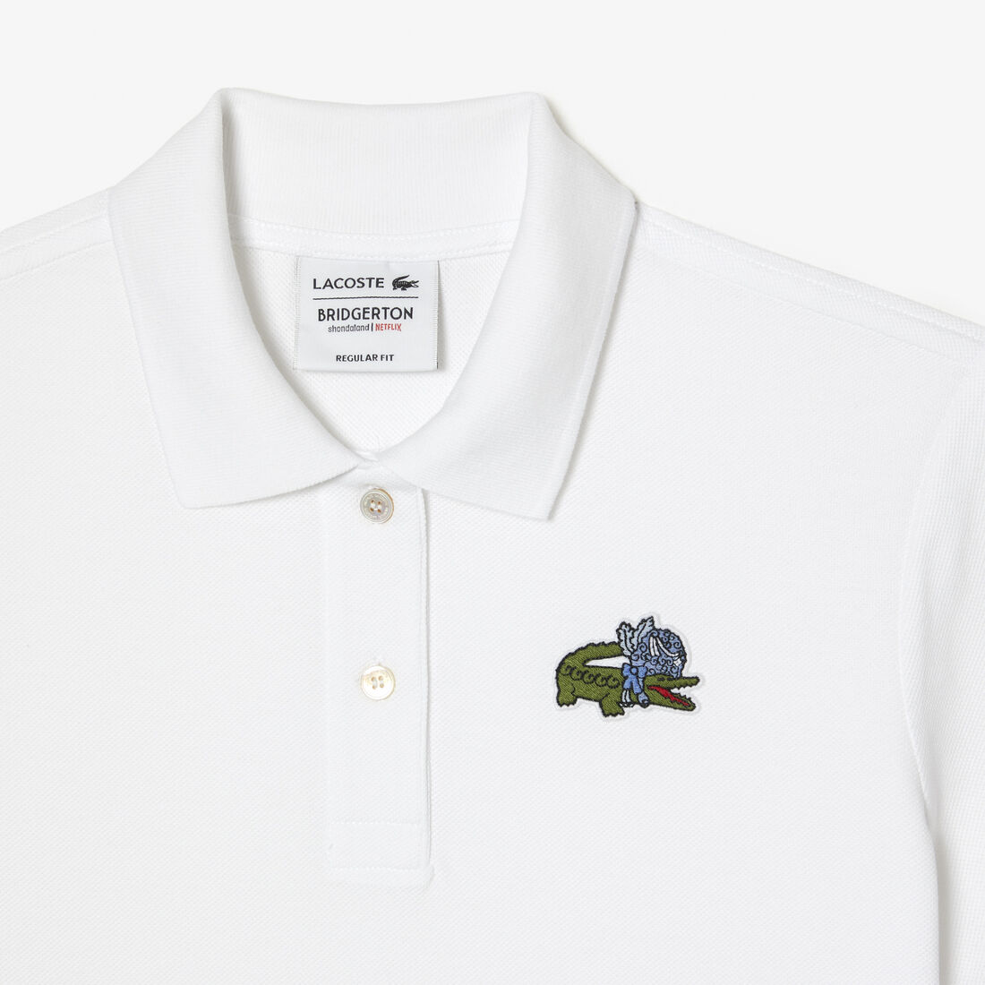 تيشيرت بولو بطبعة تمساح للنساء مجموعة Lacoste x Netflix تيشيرت بولو بطبعة تمساح للنساء مجموعة Lacoste x Netflix