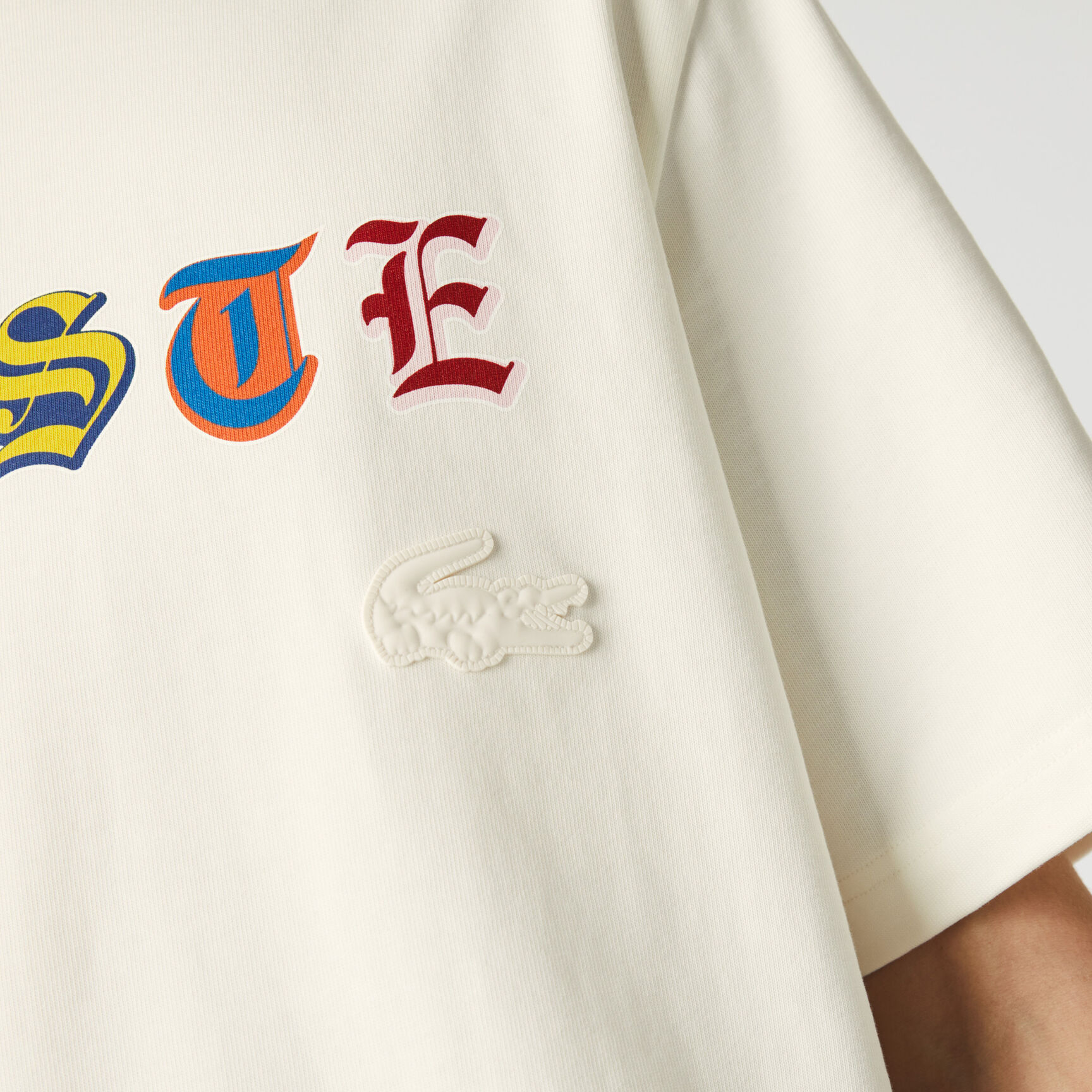 تيشيرت رجالي من القطن متعدد الألوان ذو قصة فضفاضة من مجموعة Lacoste L!VE