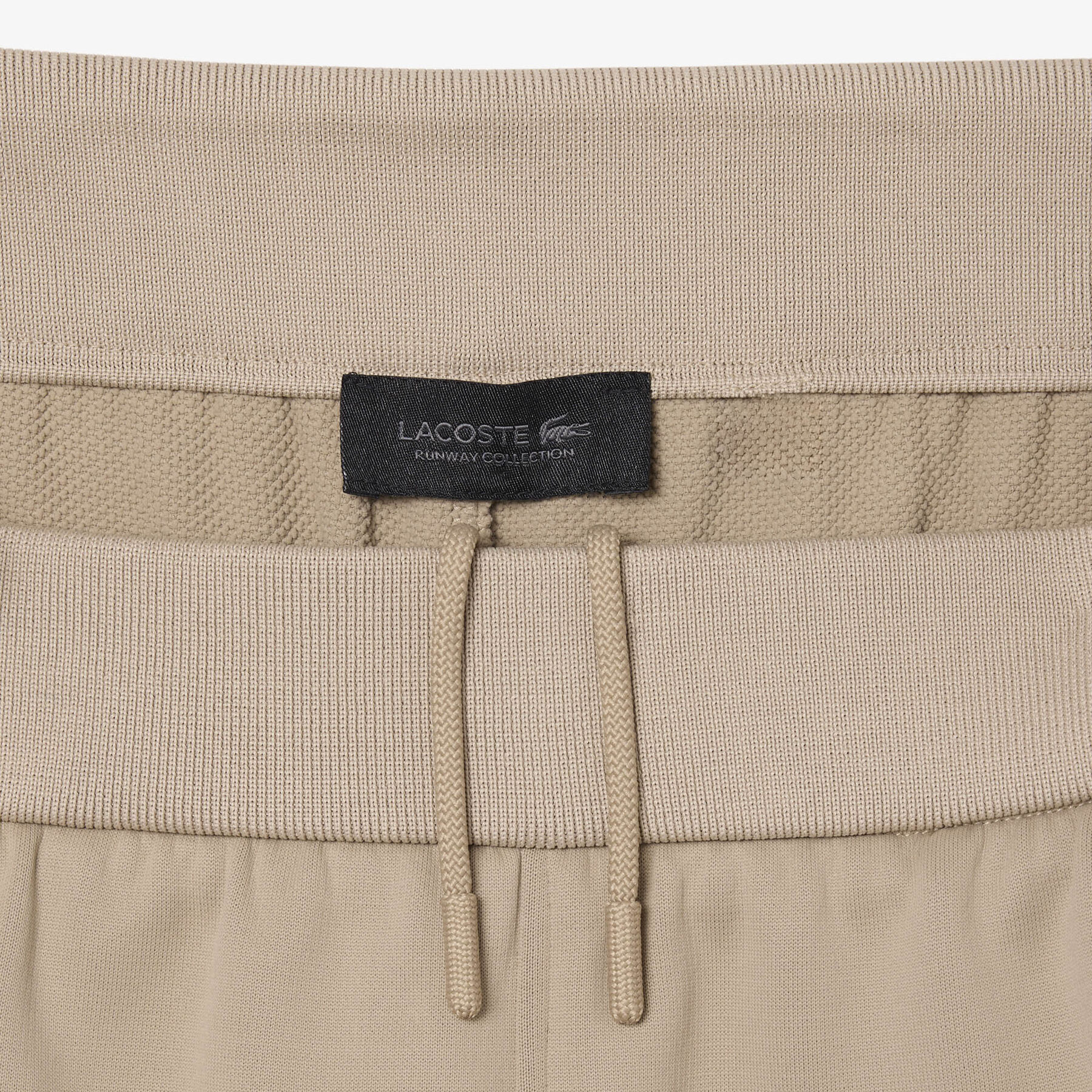 lacoste runway loose fit satin joggers