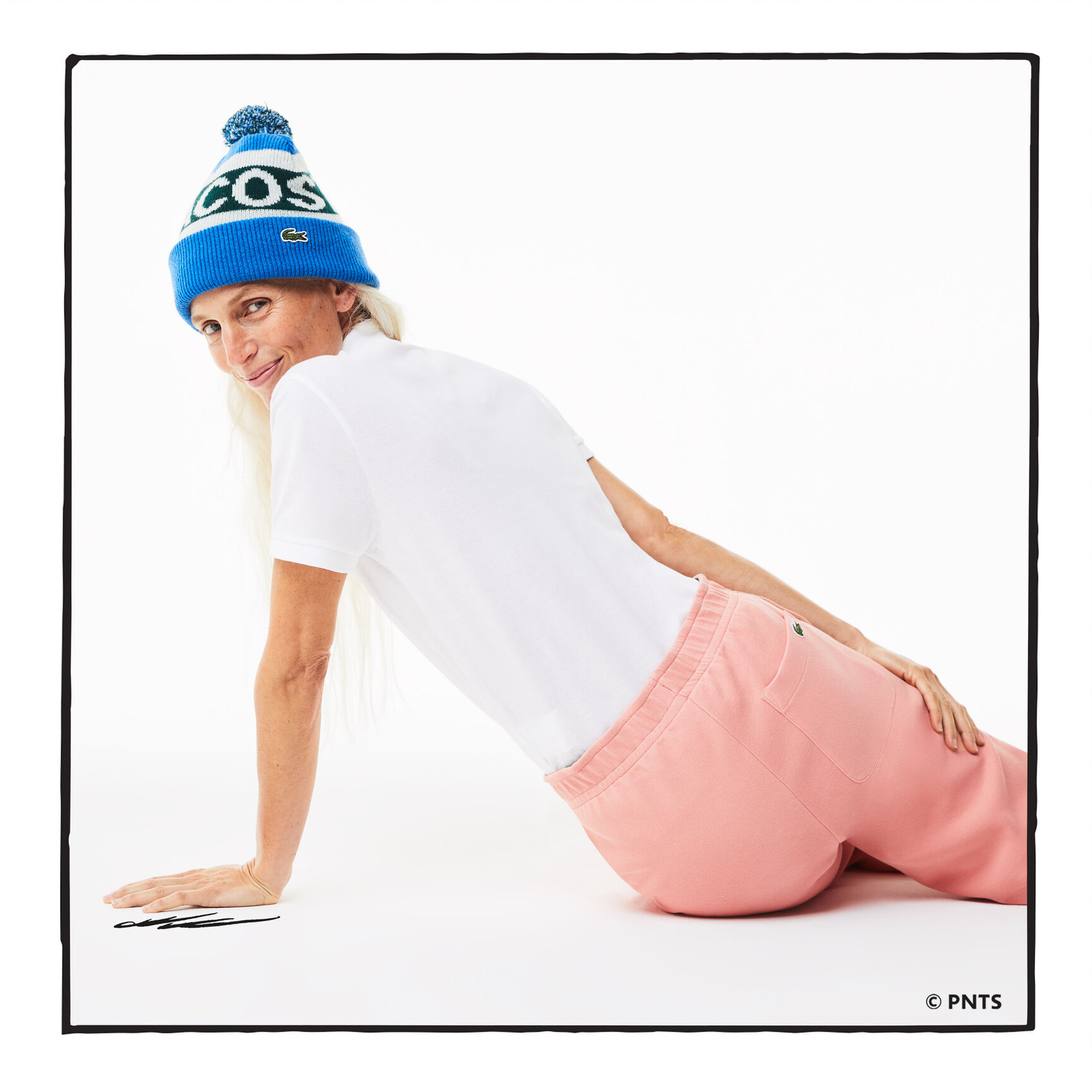 قميص بولو نسائي من القطن العضوي ذو قصة عادية من Lacoste x Peanuts قميص بولو نسائي من القطن العضوي ذو قصة عادية من Lacoste x Peanuts