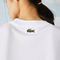 لاكوست تي شيرت قطني للجنسين قصة فضفاضة من مجموعة lacoste live و polaroid