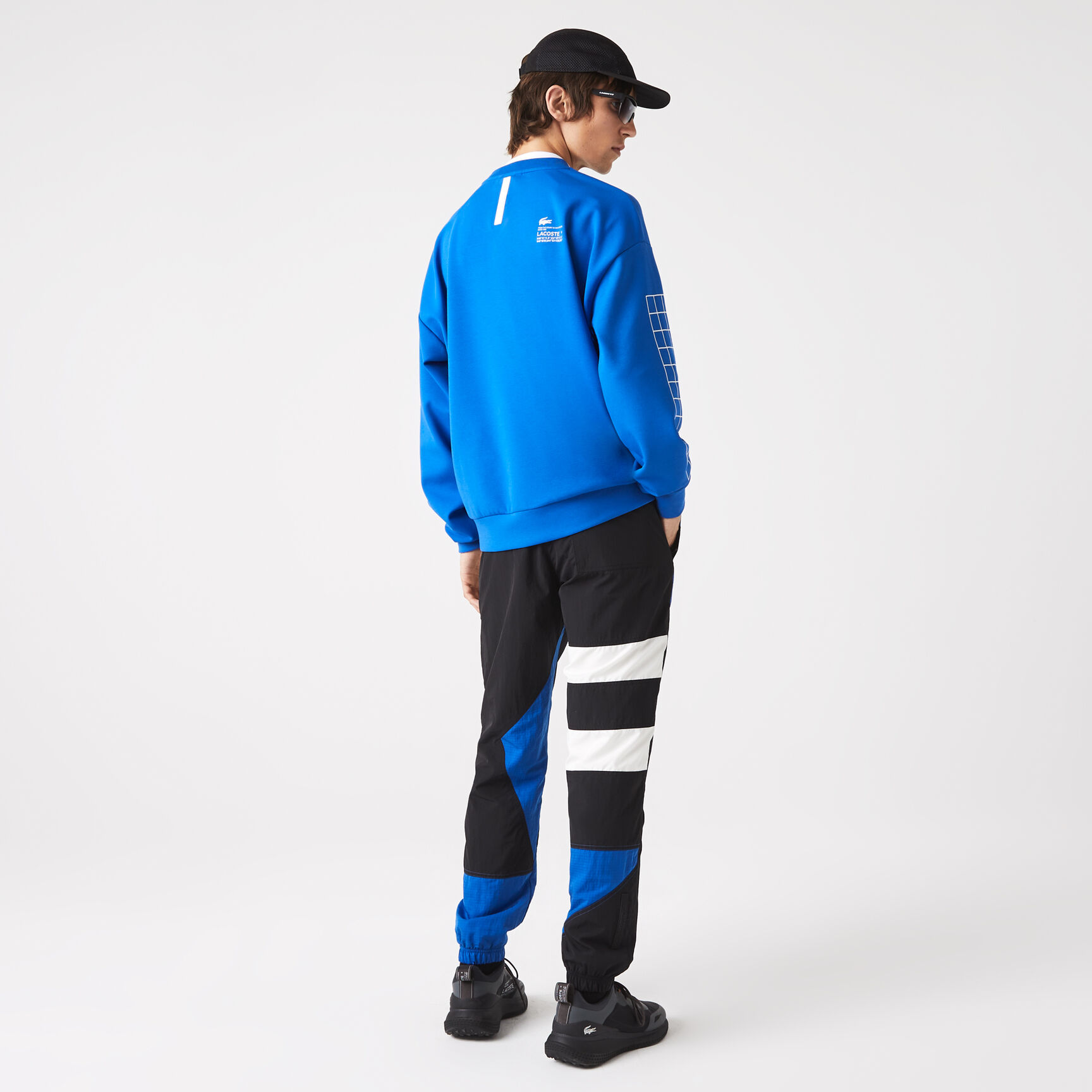 بنطال رياضي لاكوست مقسم لأجزاء ومقاوم للماء للرجال بنطال رياضي لاكوست مقسم لأجزاء ومقاوم للماء للرجال