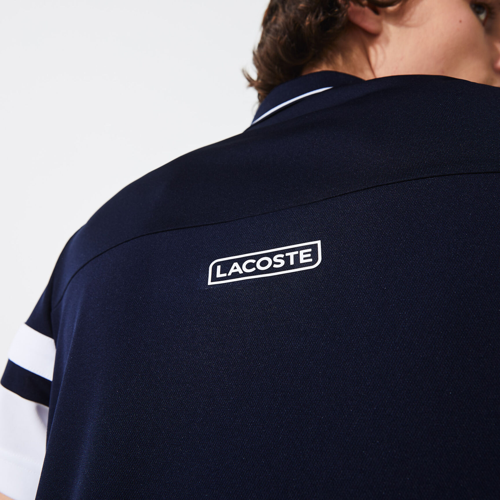 قميص بولو للتنس من البيكيه المسامي للرجال مع أكمام مقلمة مجموعة Lacoste SPORT قميص بولو للتنس من البيكيه المسامي للرجال مع أكمام مقلمة مجموعة Lacoste SPORT