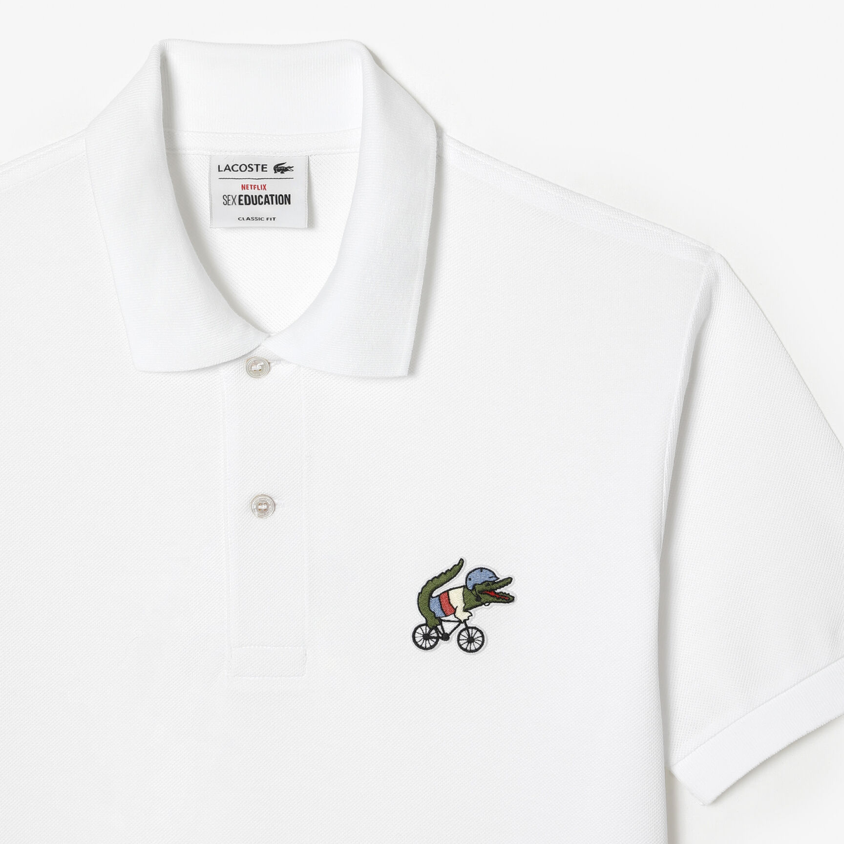 تيشيرت بولو قطن عضوي للرجال مجموعة Lacoste x Netflix تيشيرت بولو قطن عضوي للرجال مجموعة Lacoste x Netflix