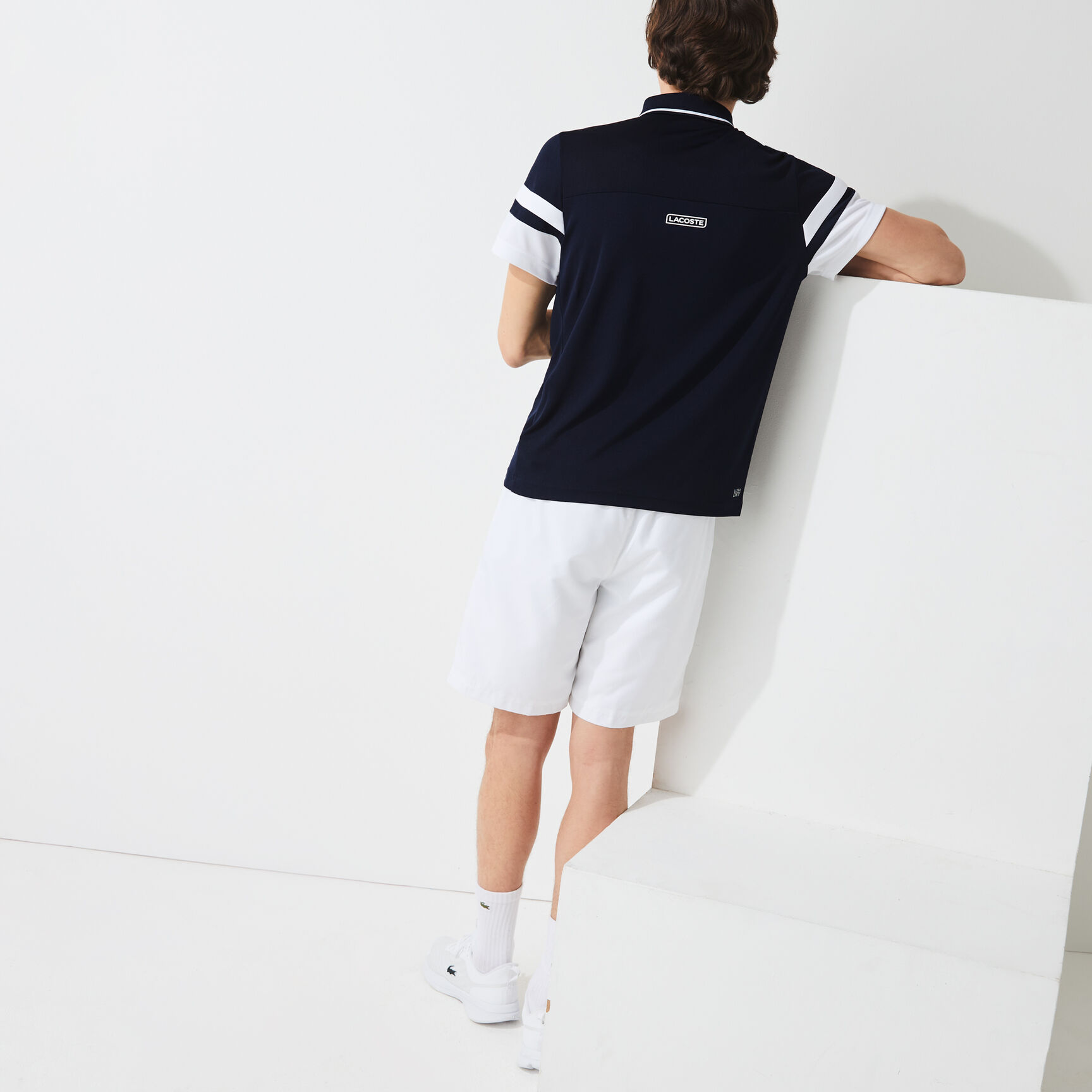 قميص بولو للتنس من البيكيه المسامي للرجال مع أكمام مقلمة مجموعة Lacoste SPORT قميص بولو للتنس من البيكيه المسامي للرجال مع أكمام مقلمة مجموعة Lacoste SPORT