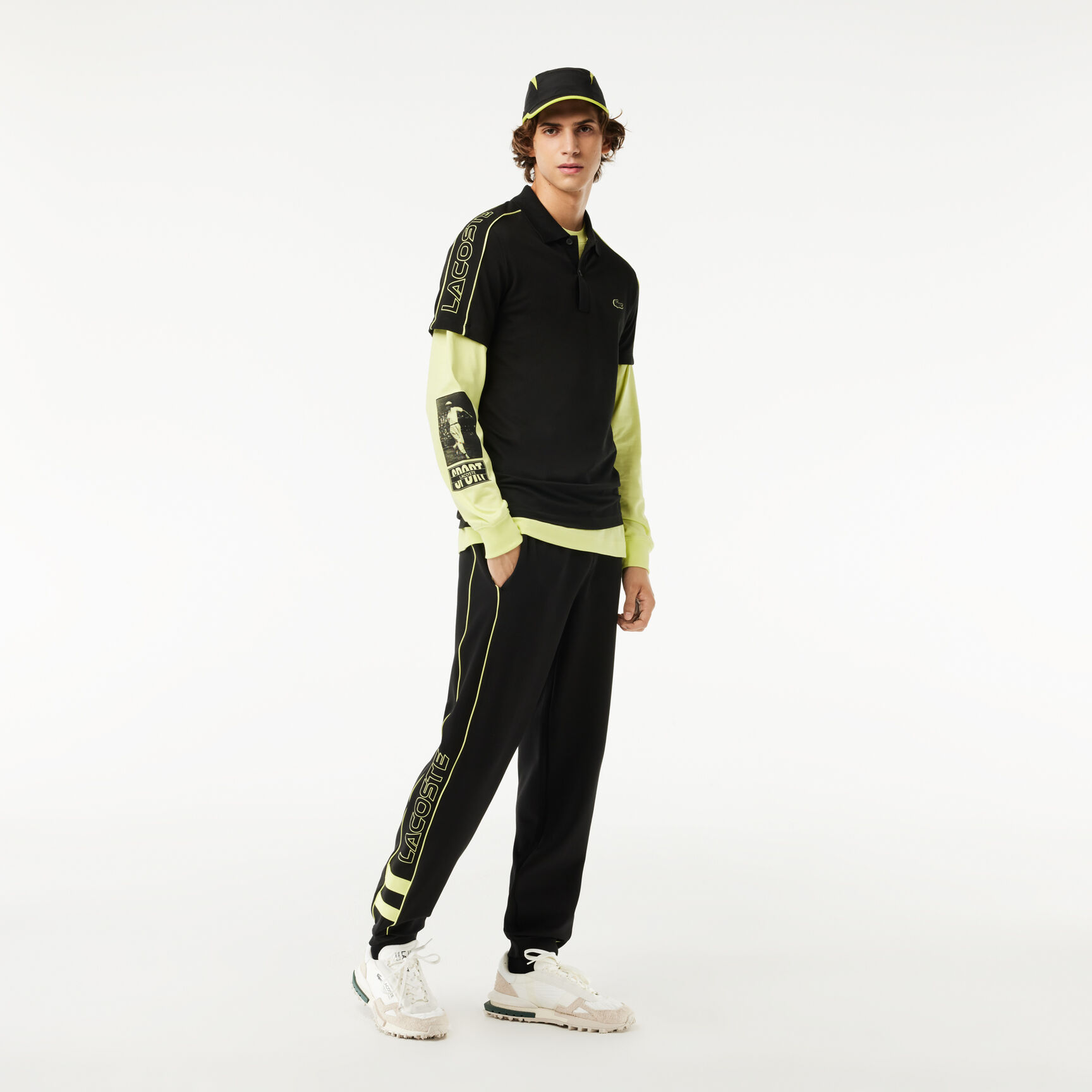 تي شيرت بولو بيكيه مطاطي مقسم بألوان بقَصّة عادية Slim Fit Lacoste Movement Polo Shirt Technical Pique - PH1426-00-6VT