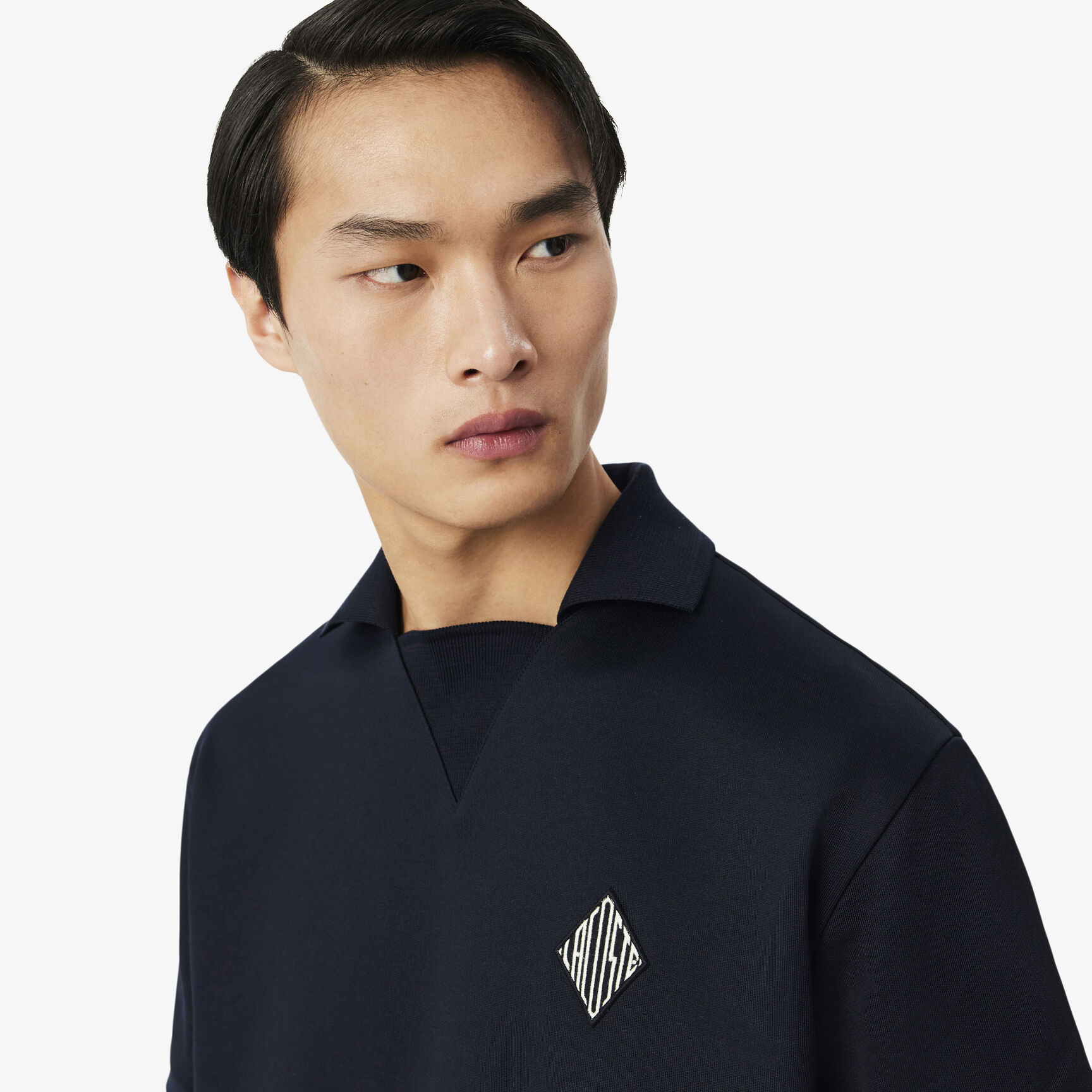 قميص بولو من الصوف بقصة فضفاضة مزين بشعار مميز Loose Fit Badge Accent Fleece Polo Shirt - DH1208-00-350