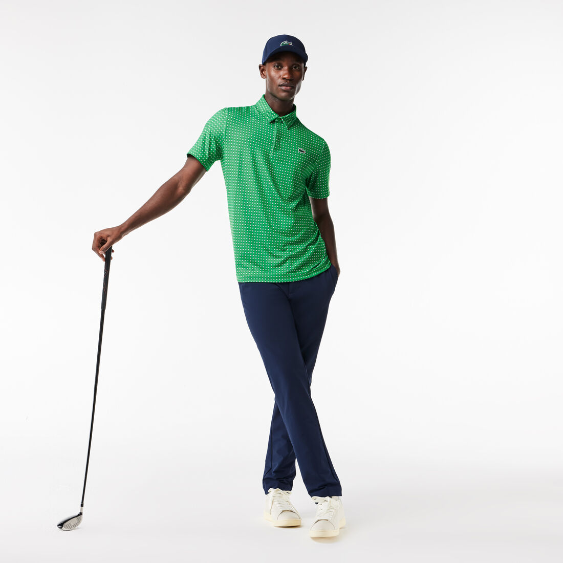 تي شيرت بولو قطن مطاطي بقصّة عادية ومزين بشريط يحمل كلمة Lacoste Men's Lacoste Golf Printed Recycled Polyester Polo Shirt - DH5175-00-QBI