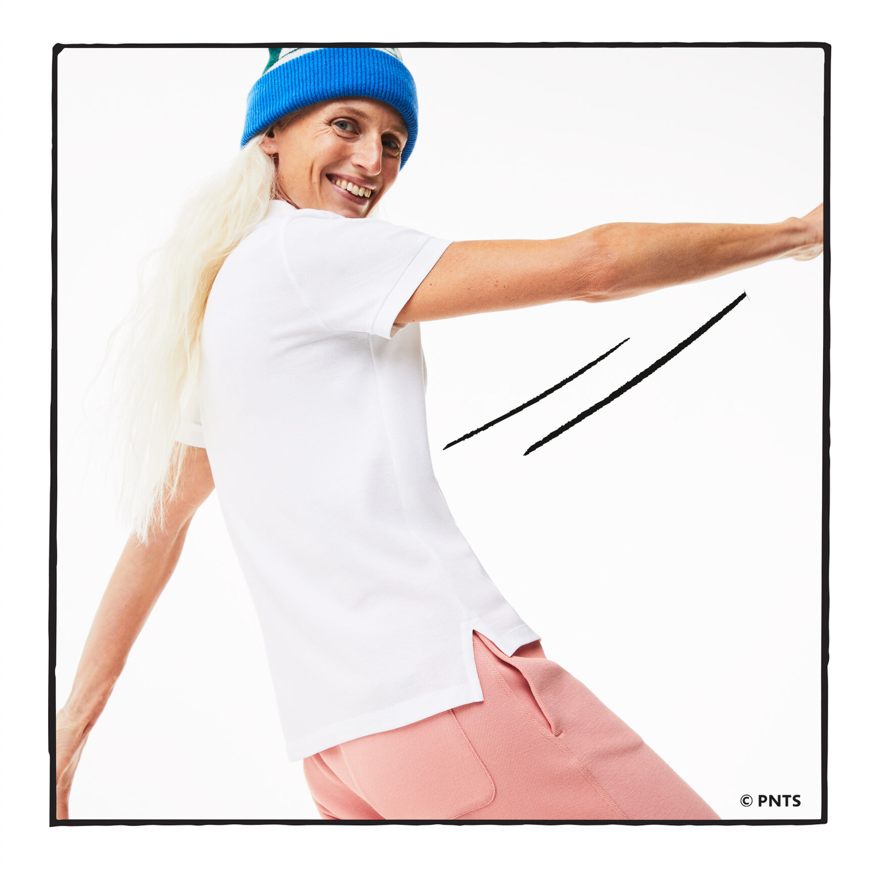 قميص بولو نسائي من القطن العضوي ذو قصة عادية من Lacoste x Peanuts قميص بولو نسائي من القطن العضوي ذو قصة عادية من Lacoste x Peanuts