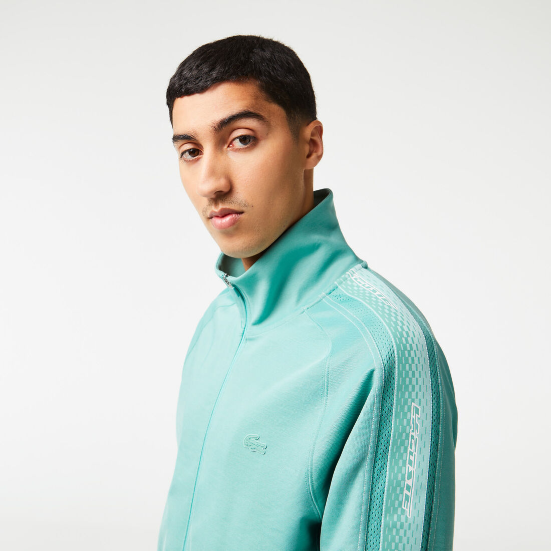 سويت شيرت لاكوست بيكيه بياقة عالية وسحّاب للرجال سويت شيرت لاكوست بيكيه بياقة عالية وسحّاب للرجال