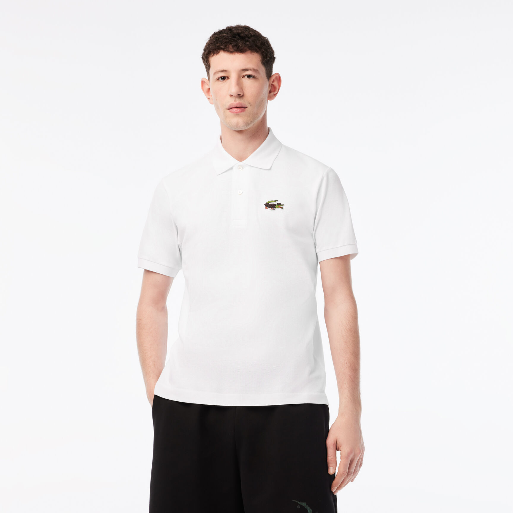 تيشيرت بولو قطن عضوي للرجال مجموعة Lacoste x Netflix تيشيرت بولو قطن عضوي للرجال مجموعة Lacoste x Netflix