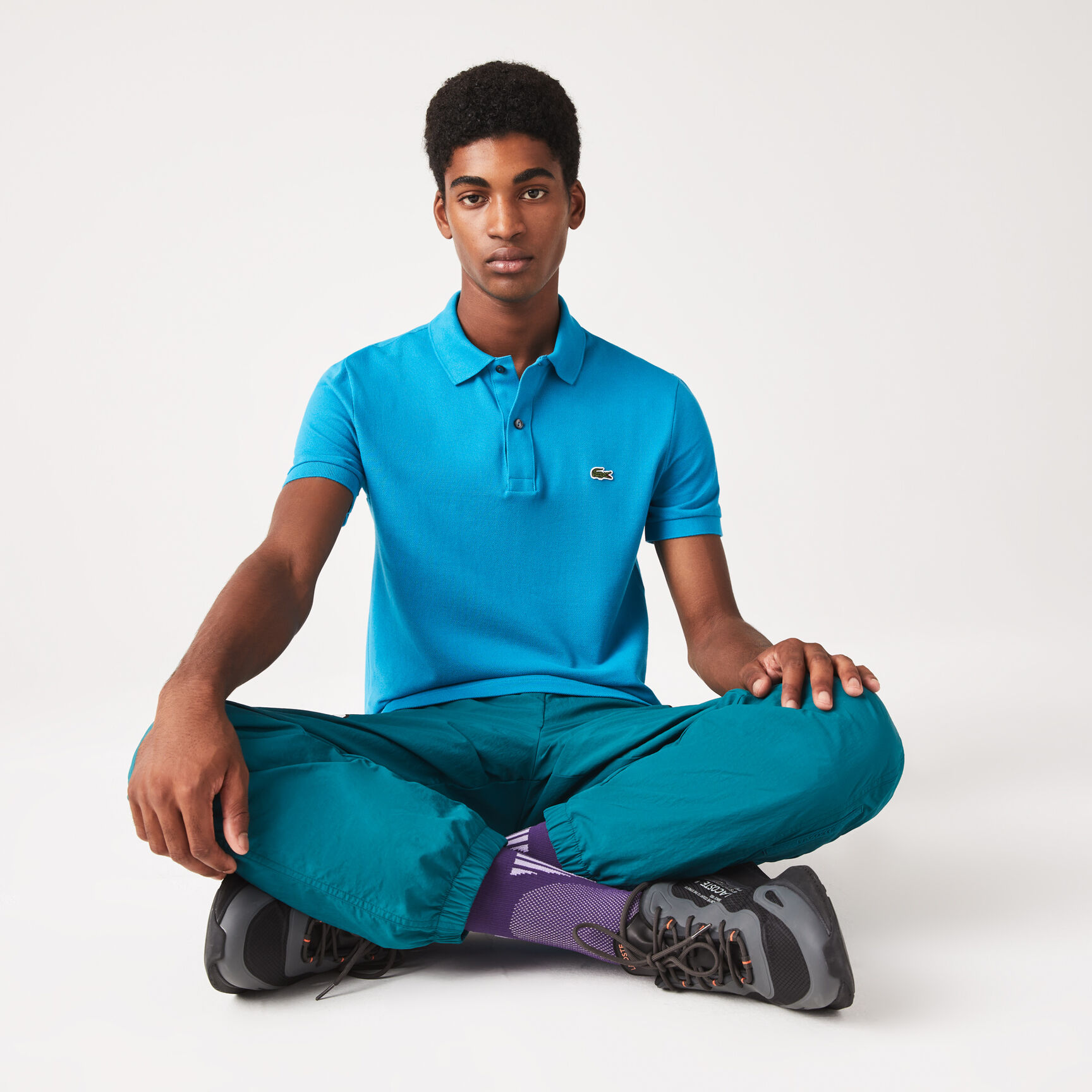 قميص بولو بيكيه بقصة ضيقة L.12.12 قميص بولو بيكيه بقصة ضيقة L.12.12