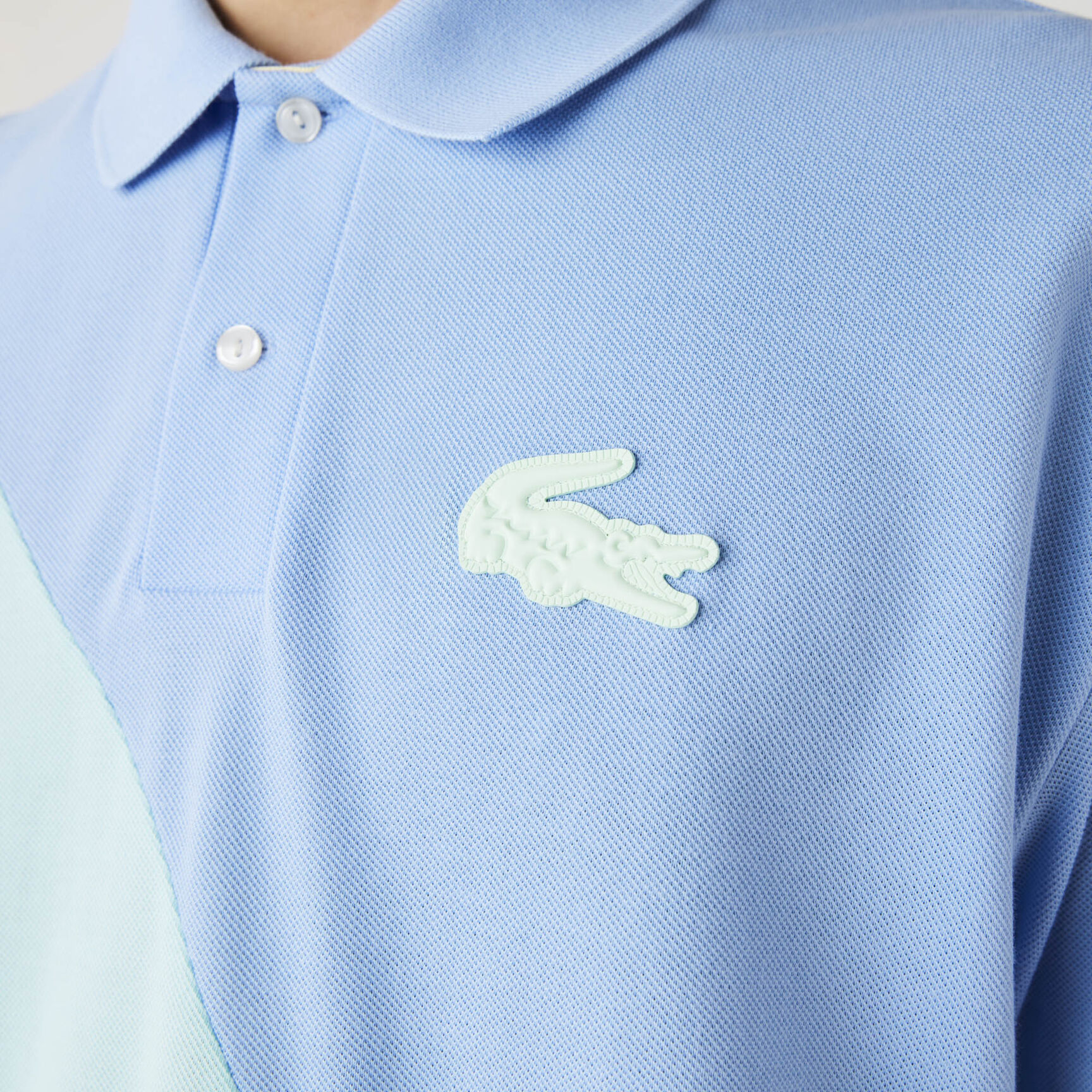 قميص بولو بيكيه القطن للجنسين بقصة فضفاضة وكتل لونية مجموعة Lacoste LIVE