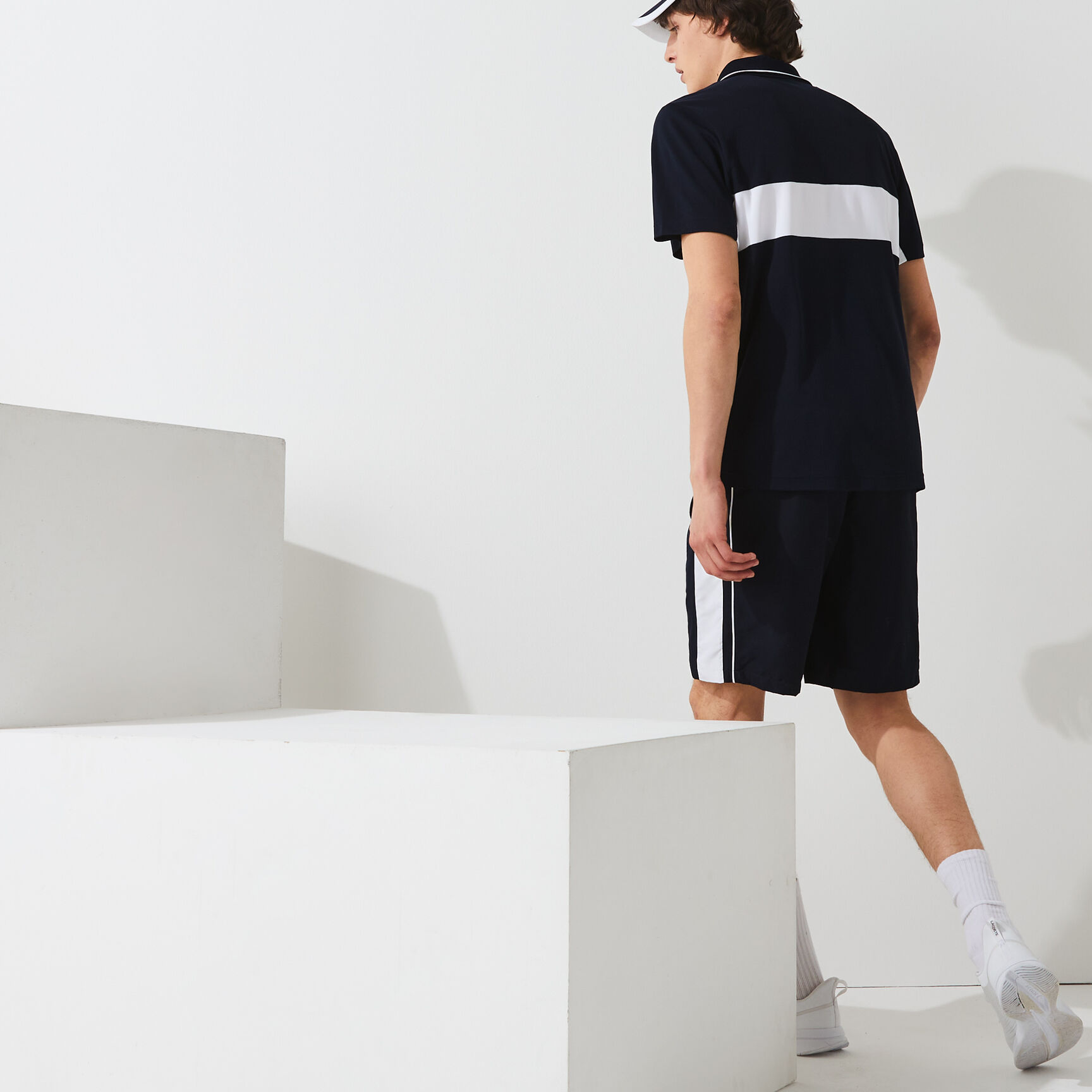 قميص بولو مقاوم مسامي للرجال مع كتل لونية مجموعة Lacoste SPORT