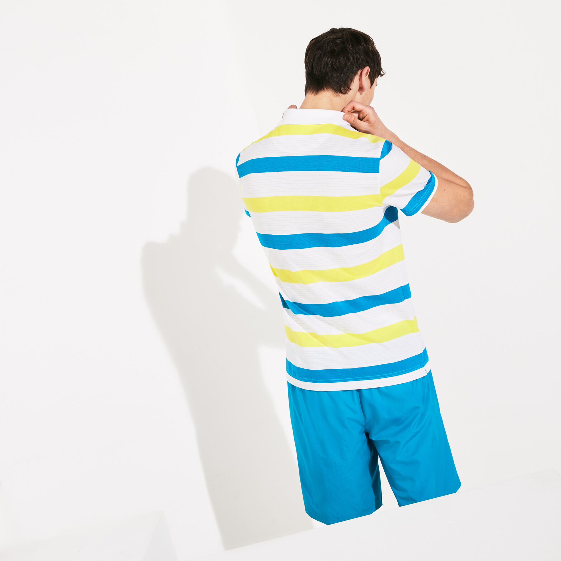 قميص بولو من مجموعة Lacoste SPORT مخطط ومحيك من قطن فائق الخفة للرجال لاكوست قميص بولو من مجموعة lacoste sport مخطط ومحيك من قطن فائق الخفة للرجال