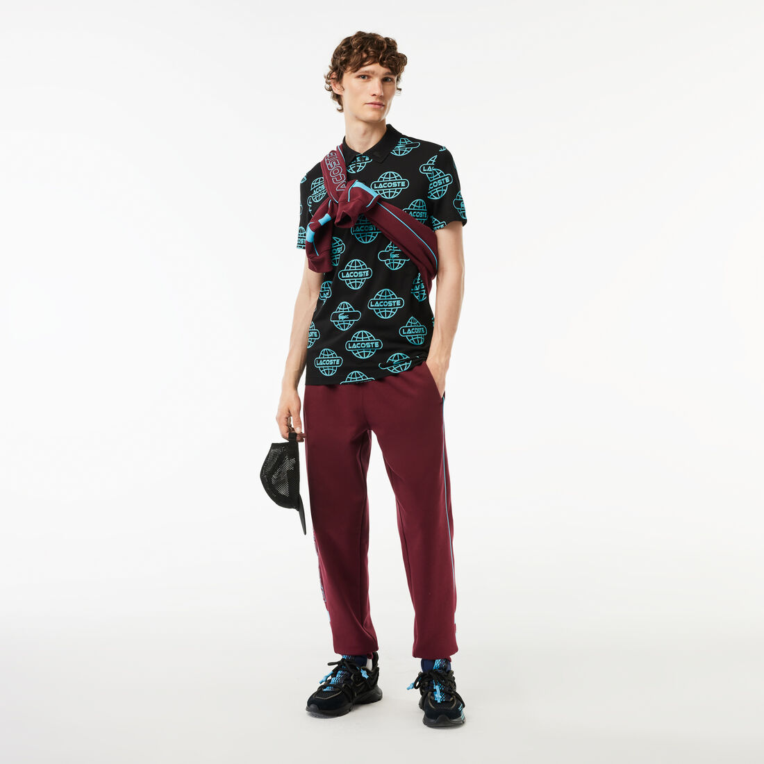 تي شيرت بولو بيكيه معالج بقصّة ضيقة من مجموعة لاكوست موفمنت Globe Print Ultralight Pique Lacoste Movement Polo Shirt - PH1175-00-QPI