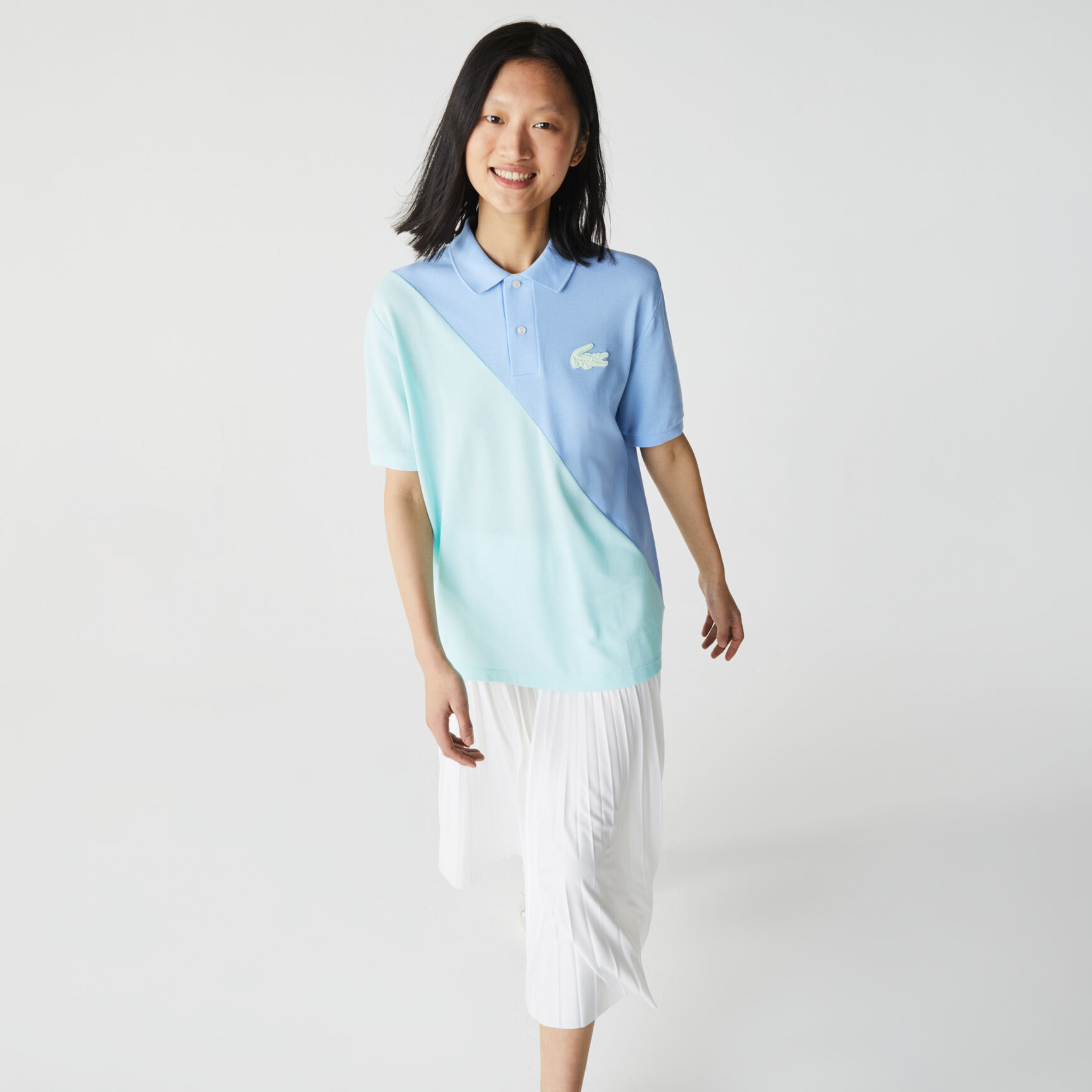 قميص بولو بيكيه القطن للجنسين بقصة فضفاضة وكتل لونية مجموعة Lacoste LIVE