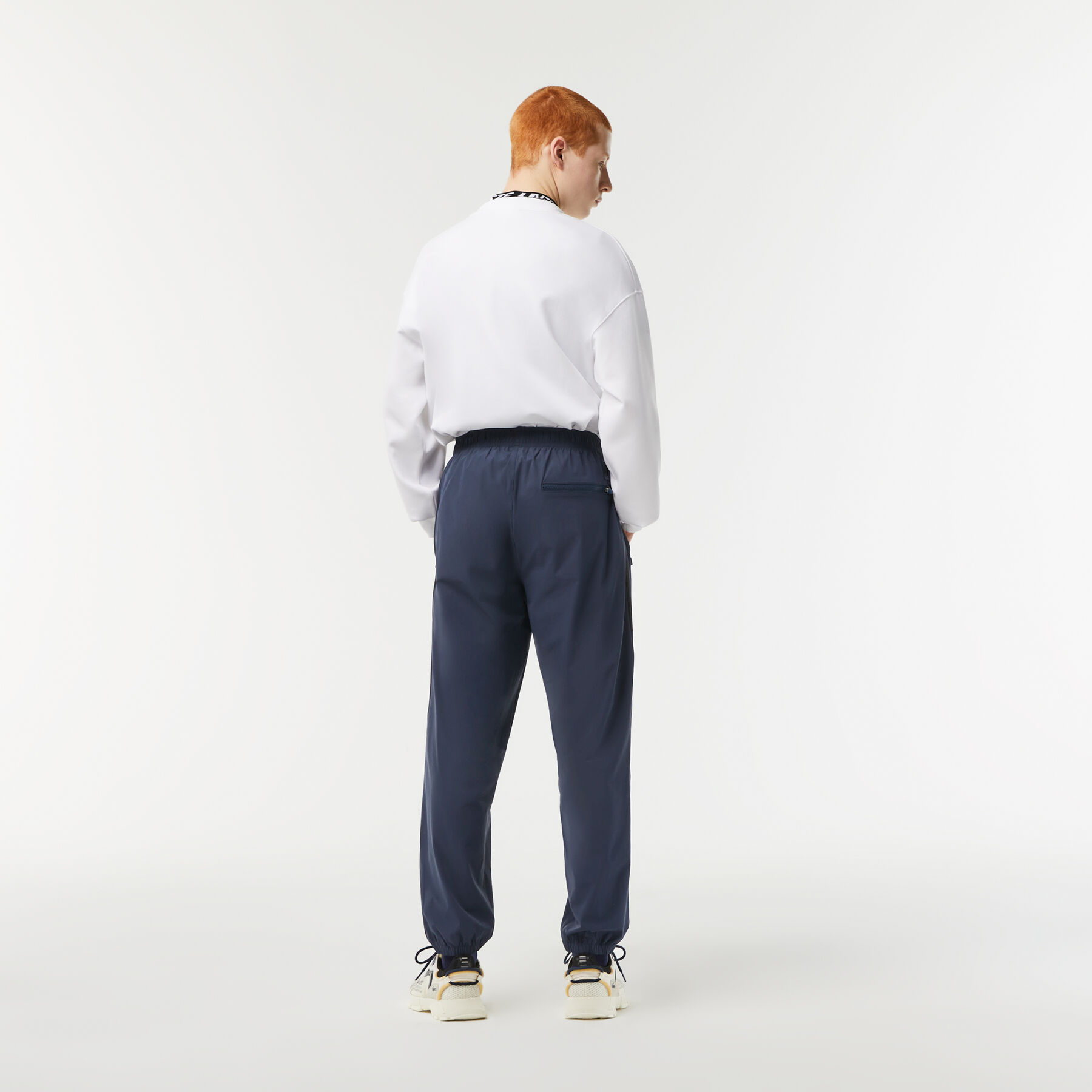 Men's Lacoste Showerproof Stretch Track Pants men s lacoste showerproof stretch track pants