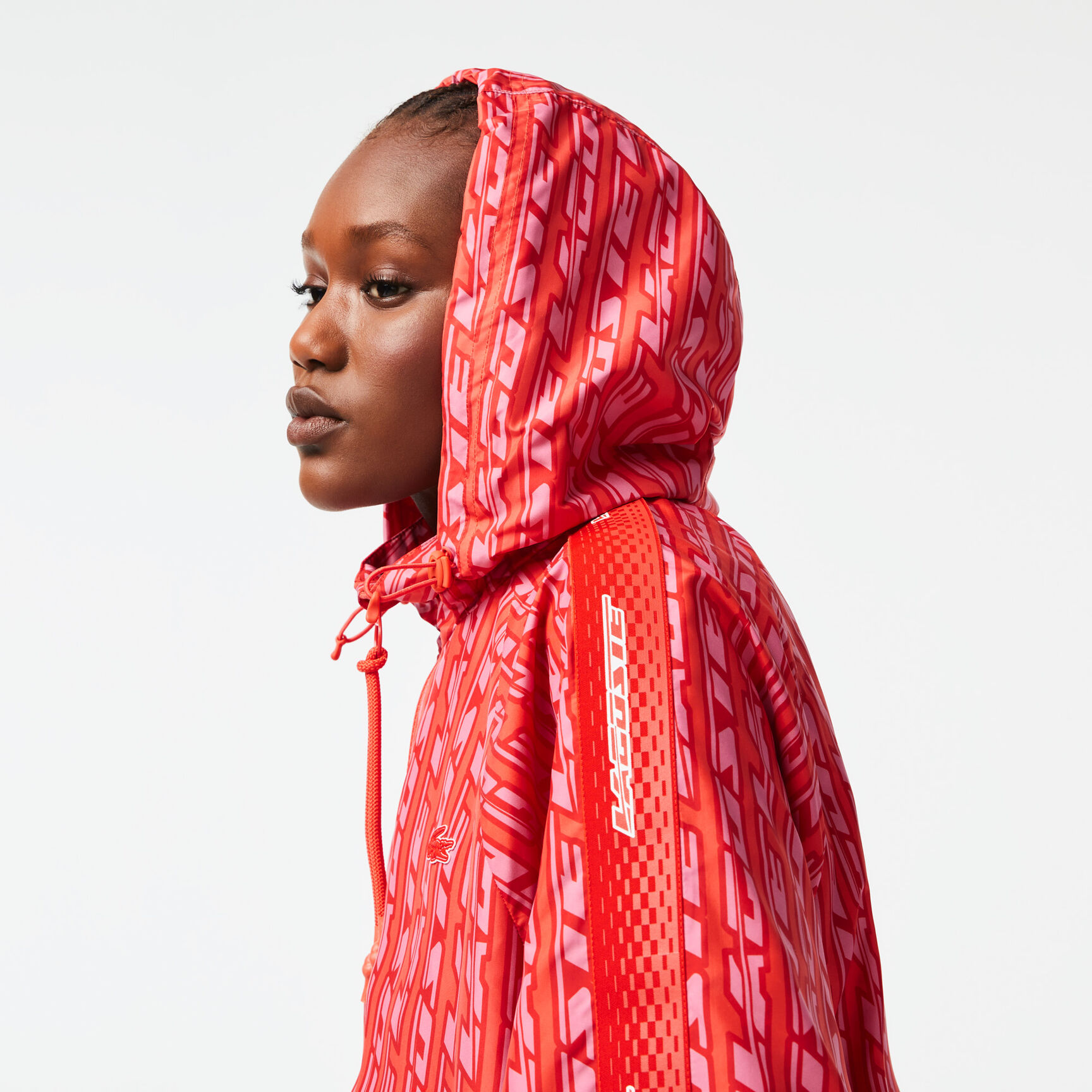 جاكيت رياضي لاكوست بقصة فضفاضة وغطاء للرأس للنساء