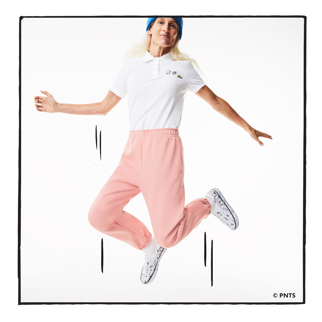 قميص بولو نسائي من القطن العضوي ذو قصة عادية من Lacoste x Peanuts